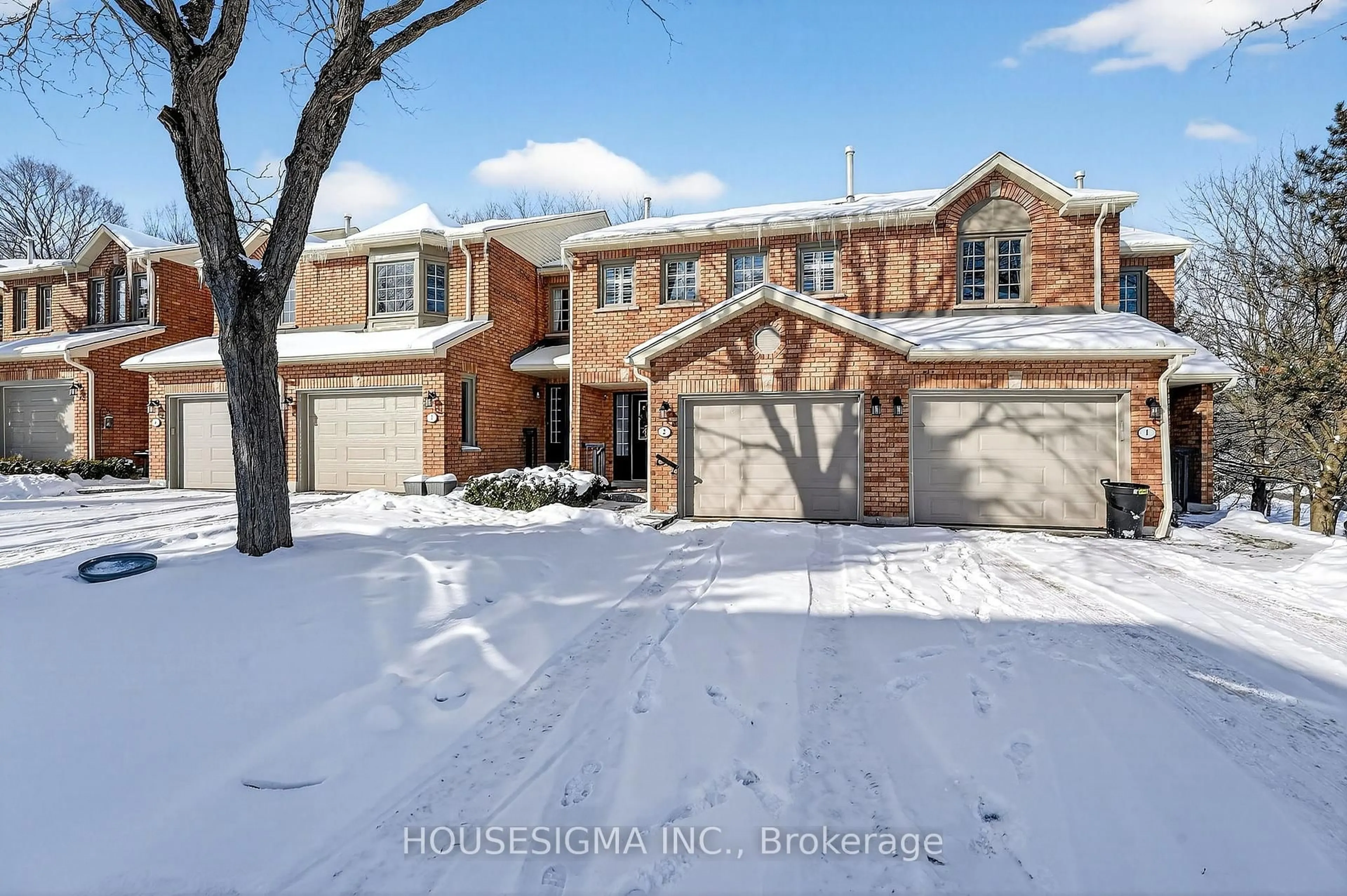 Home with brick exterior material, street for 14 Huntingwood Ave #2, Hamilton Ontario L9H 6X3
