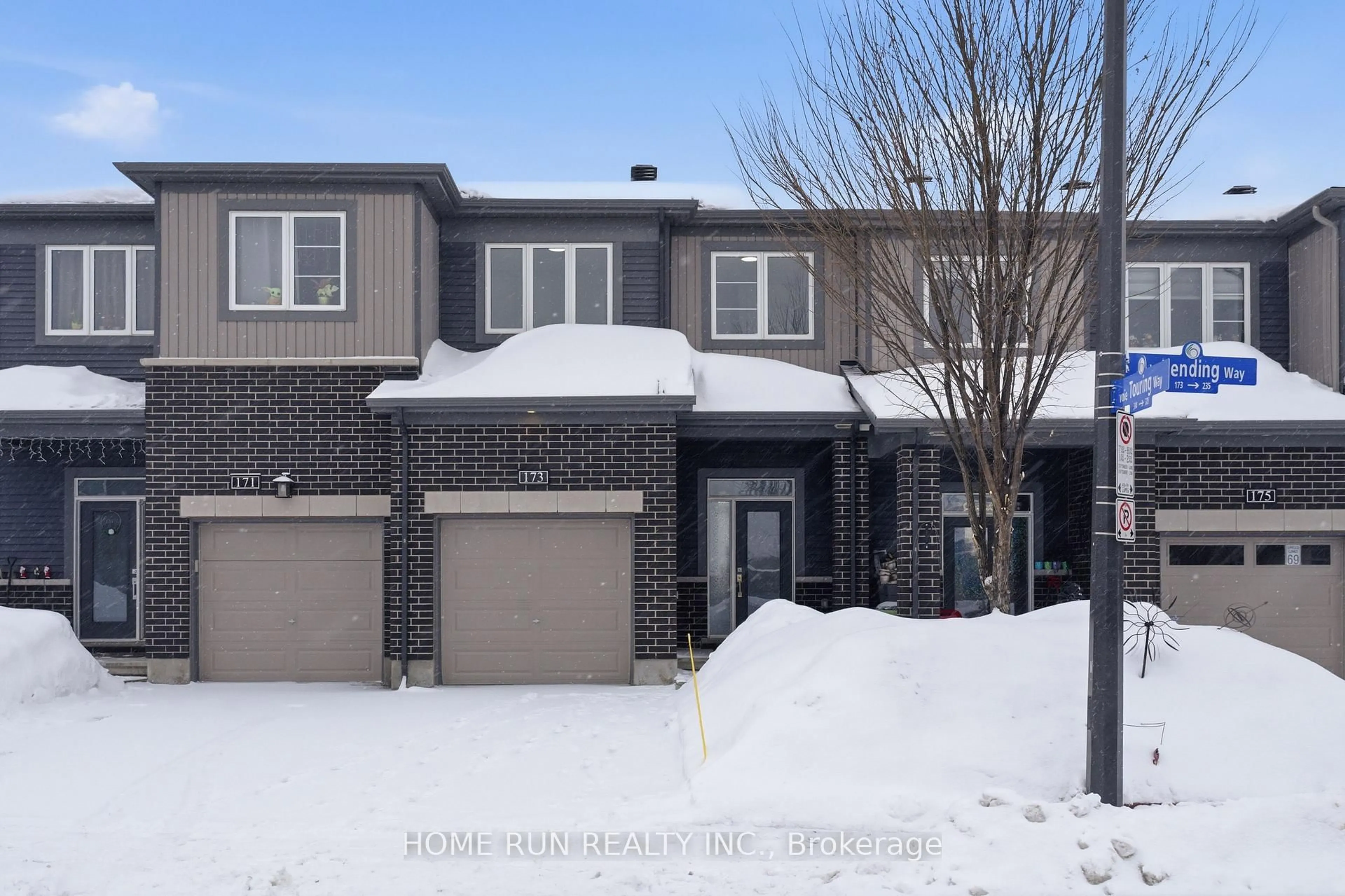 Home with brick exterior material, street for 173 Bending Way, Ottawa Ontario K2J 6P2