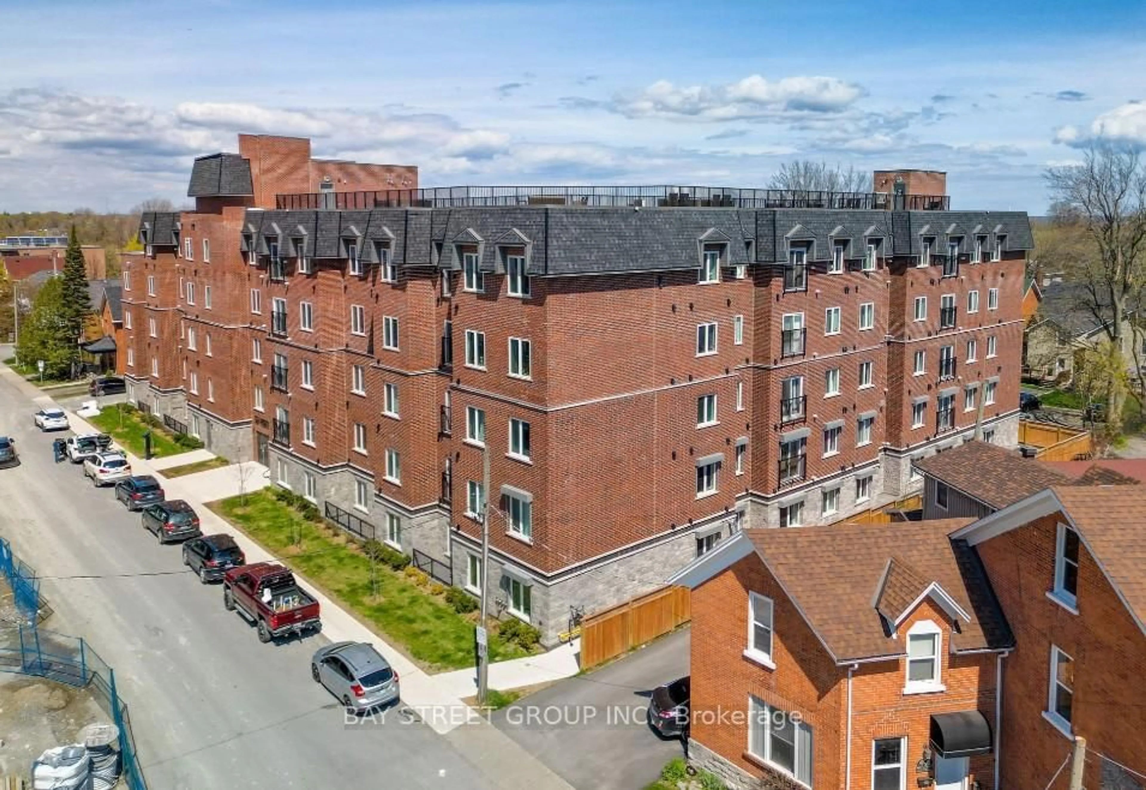 A pic from outside/outdoor area/front of a property/back of a property/a pic from drone, unknown for 501 Frontenac St #213, Kingston Ontario K7K 4L9