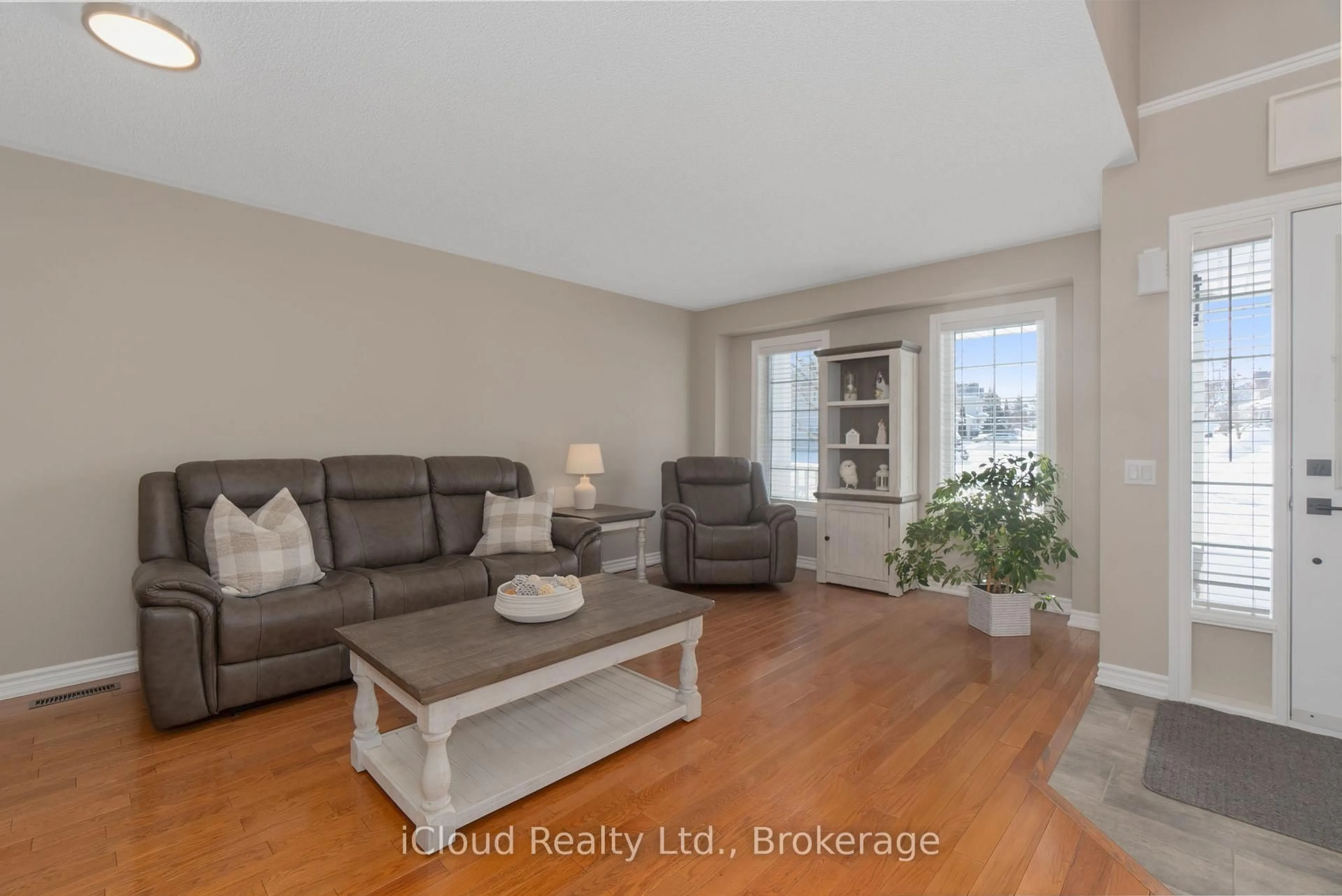 Living room with furniture, wood/laminate floor for 869 Greenwood Cres, Shelburne Ontario L9V 3C2