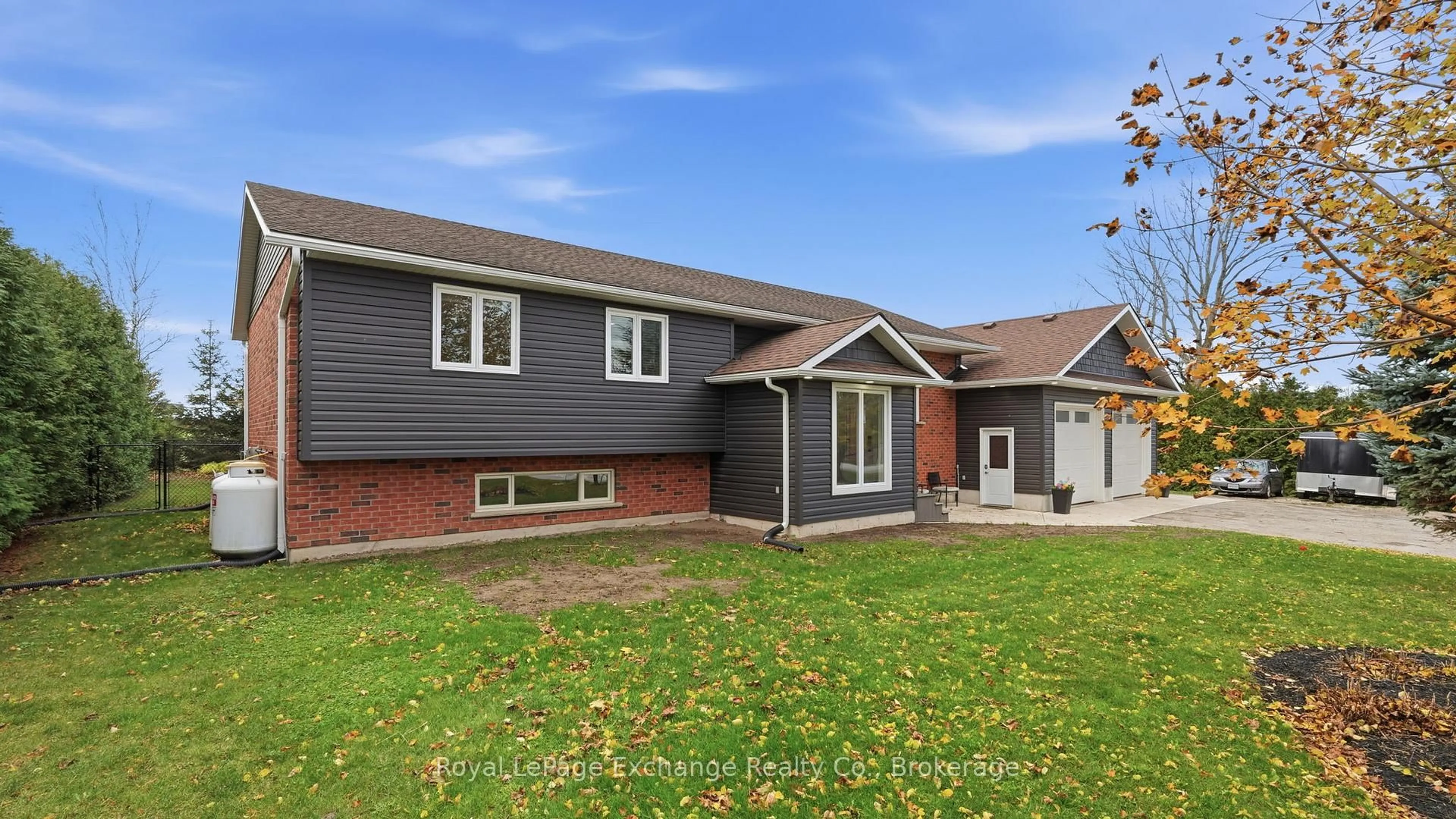 Home with brick exterior material, street for 2295 12th Concession, Huron-Kinloss Ontario N2Z 2X3