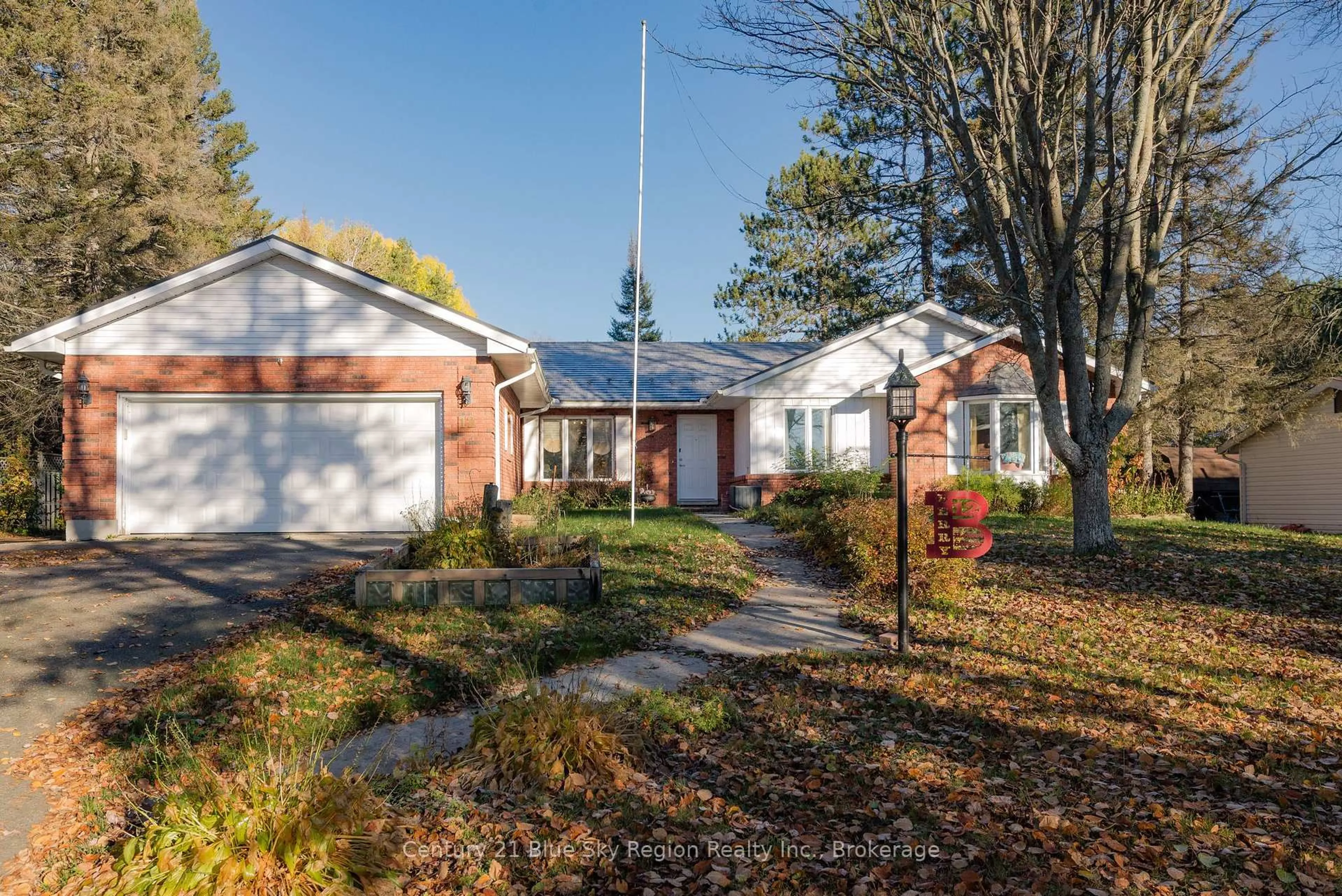 Home with brick exterior material, street for 12 Robert St, Sundridge Ontario P0A 1Z0