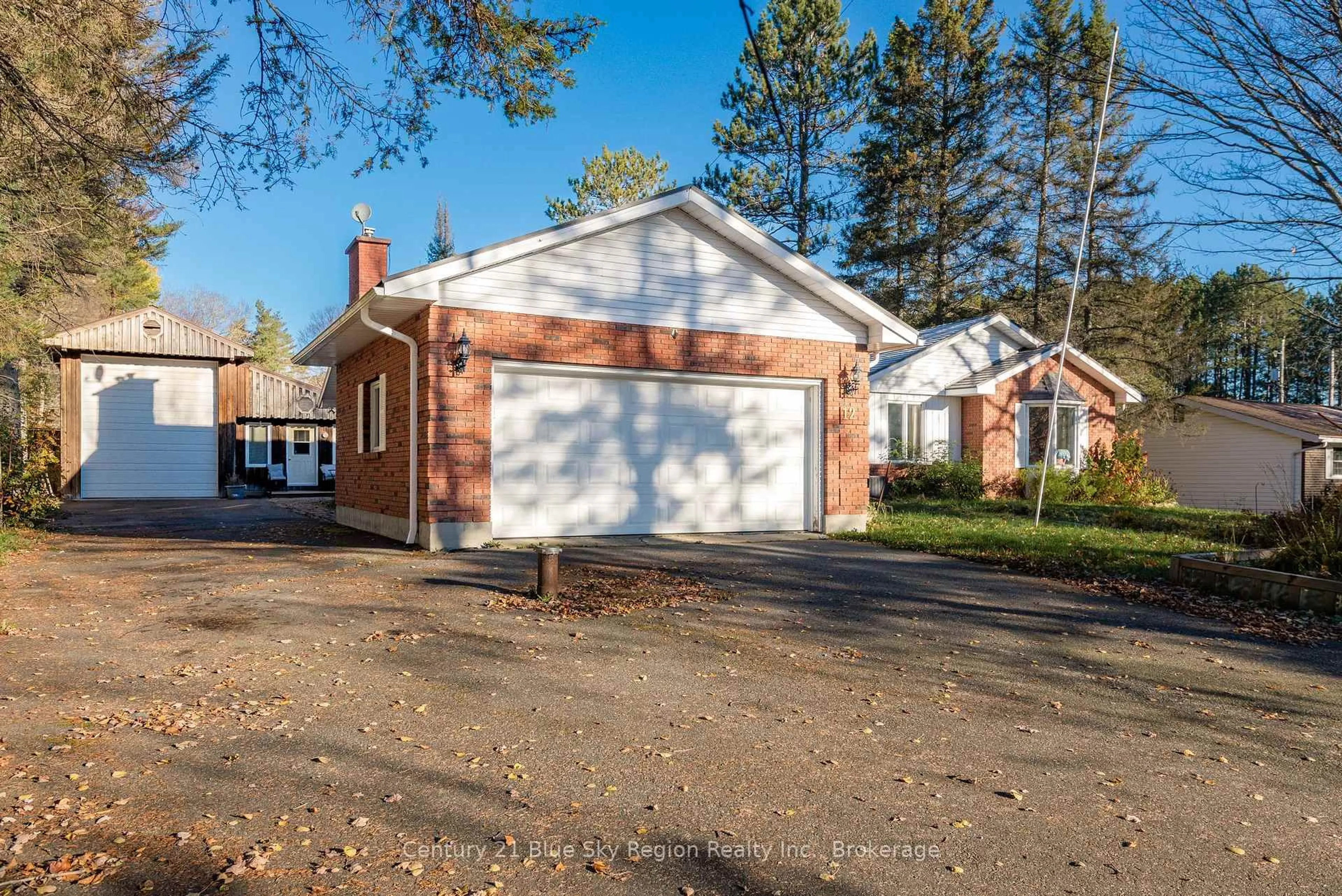 Home with brick exterior material, street for 12 Robert St, Sundridge Ontario P0A 1Z0