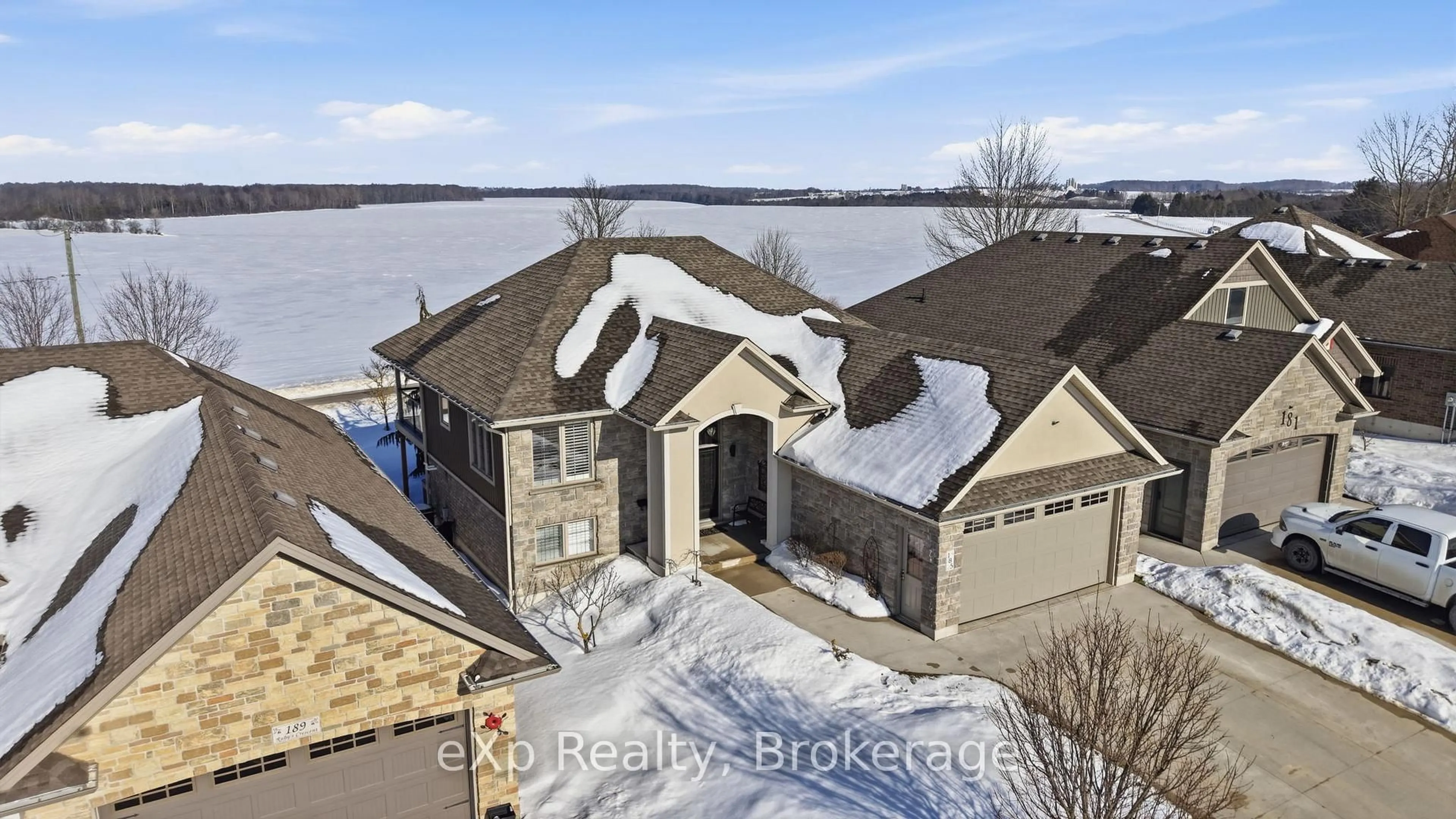 A pic from outside/outdoor area/front of a property/back of a property/a pic from drone, water/lake/river/ocean view for 185 Ruby's Cres, Wellington North Ontario N0G 2L2