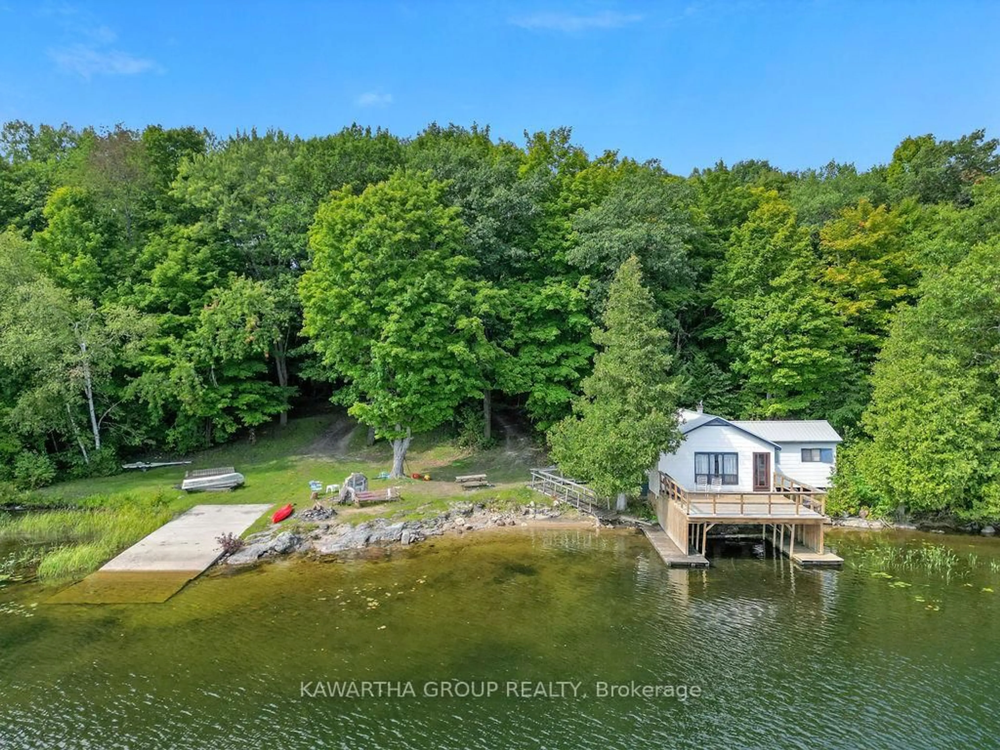 A pic from outside/outdoor area/front of a property/back of a property/a pic from drone, water/lake/river/ocean view for 7190 35 Highway, Kawartha Lakes Ontario K0M 1K0