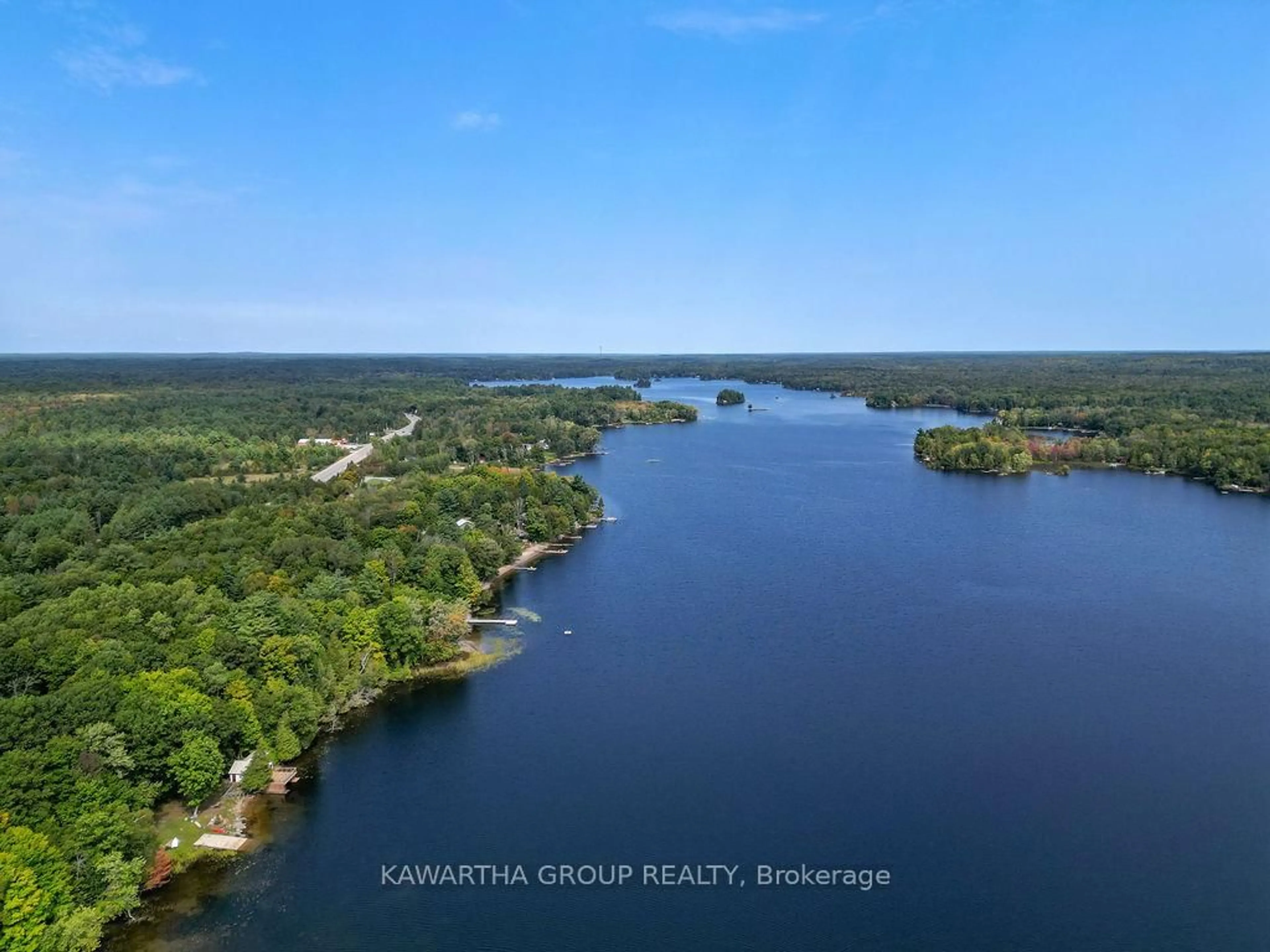 A pic from outside/outdoor area/front of a property/back of a property/a pic from drone, water/lake/river/ocean view for 7190 35 Highway, Kawartha Lakes Ontario K0M 1K0