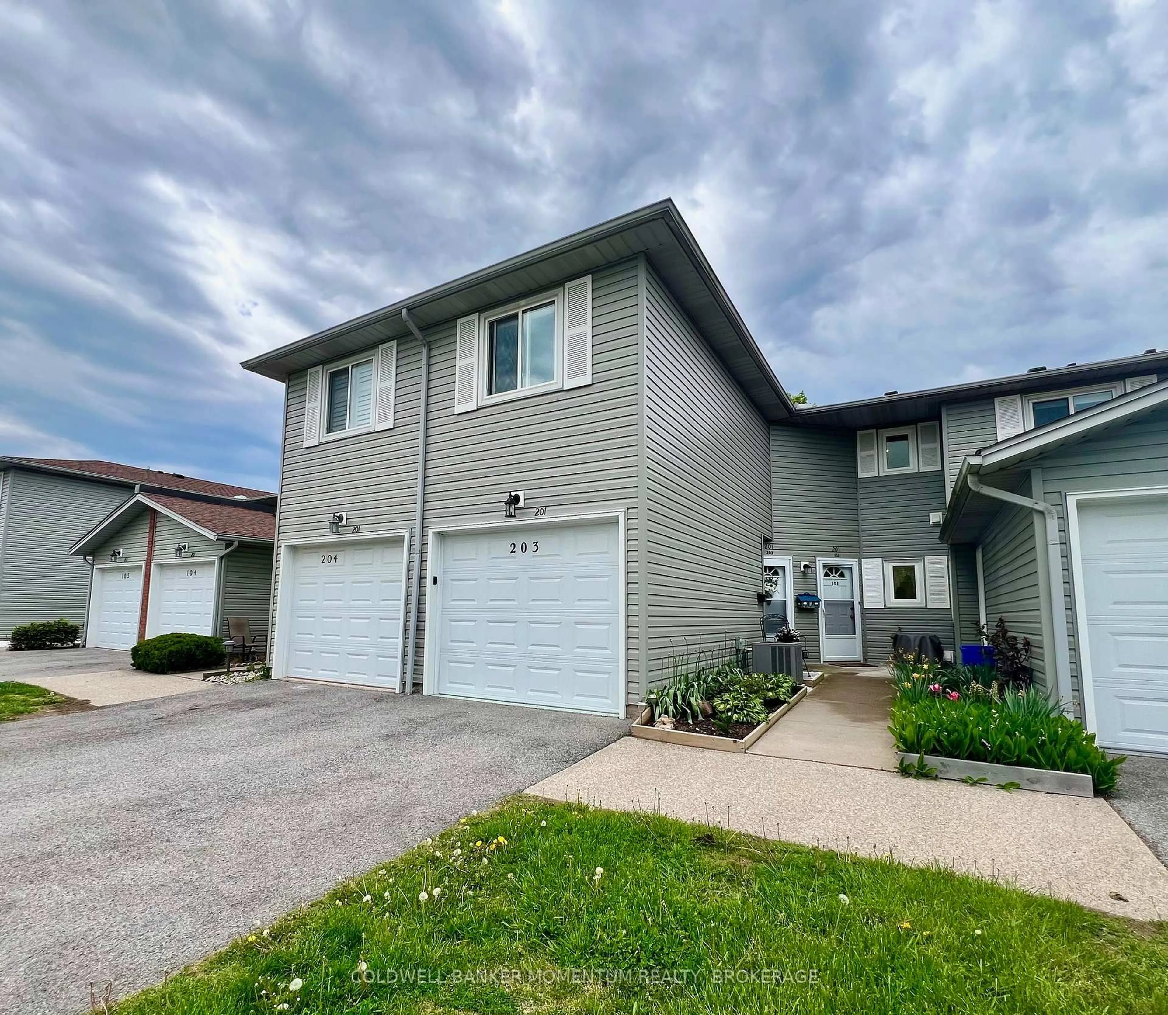 A pic from outside/outdoor area/front of a property/back of a property/a pic from drone, street for 201 Dorchester Blvd #203, St. Catharines Ontario L2M 7W1