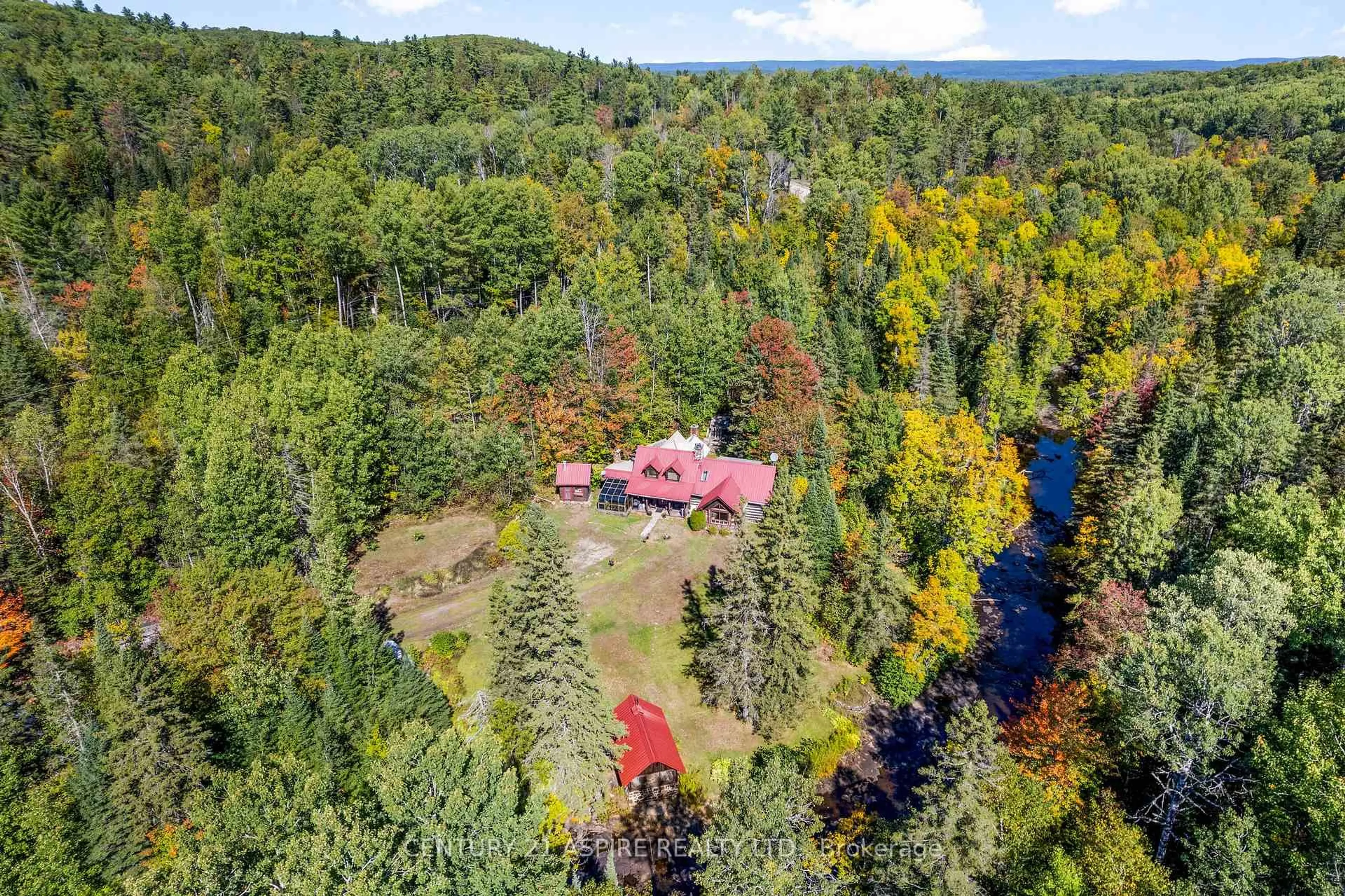 A pic from outside/outdoor area/front of a property/back of a property/a pic from drone, forest/trees view for 3050 Paugh Lake Rd, Barry's Bay Ontario K0J 1B0