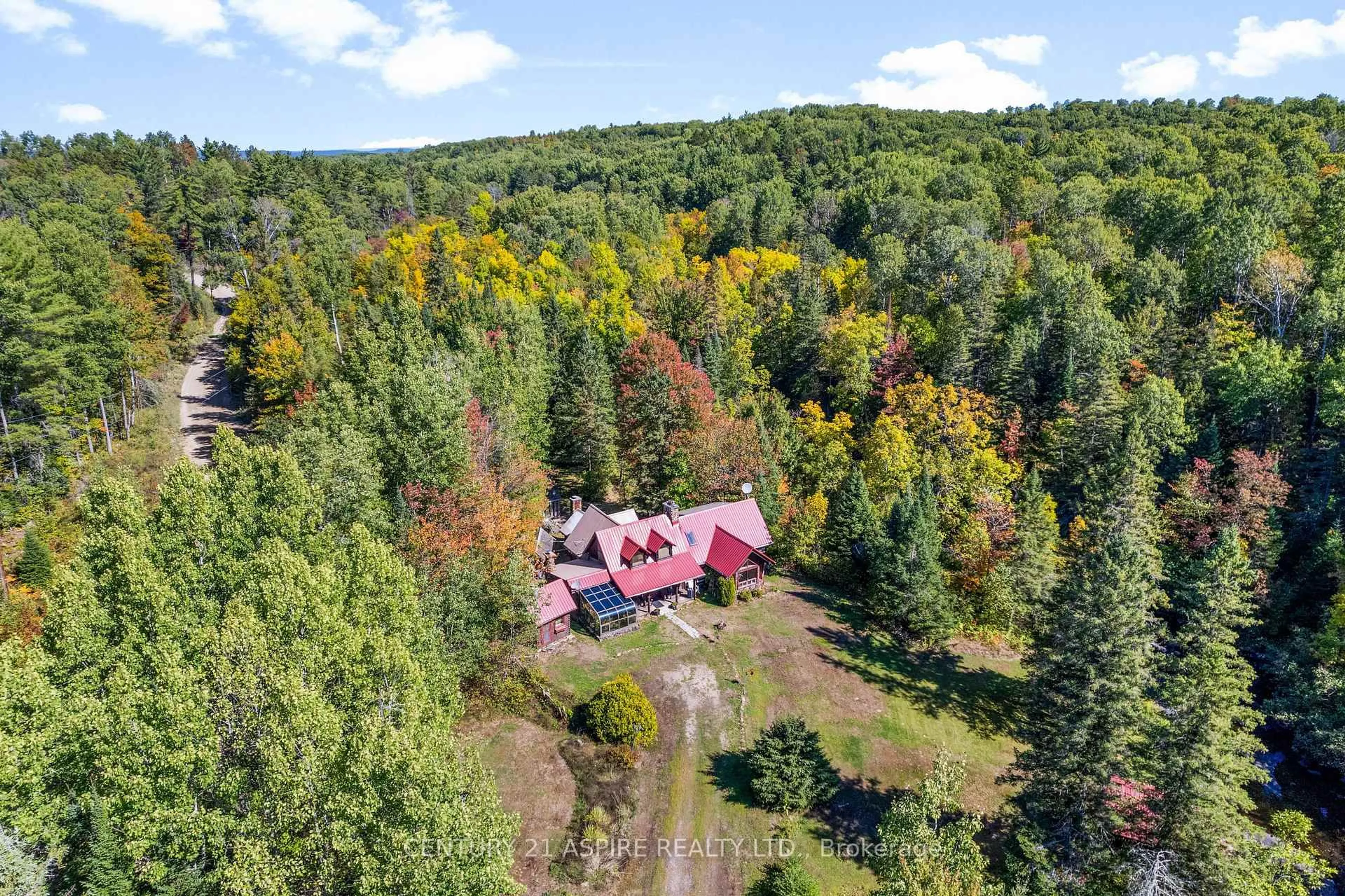 A pic from outside/outdoor area/front of a property/back of a property/a pic from drone, forest/trees view for 3050 Paugh Lake Rd, Barry's Bay Ontario K0J 1B0