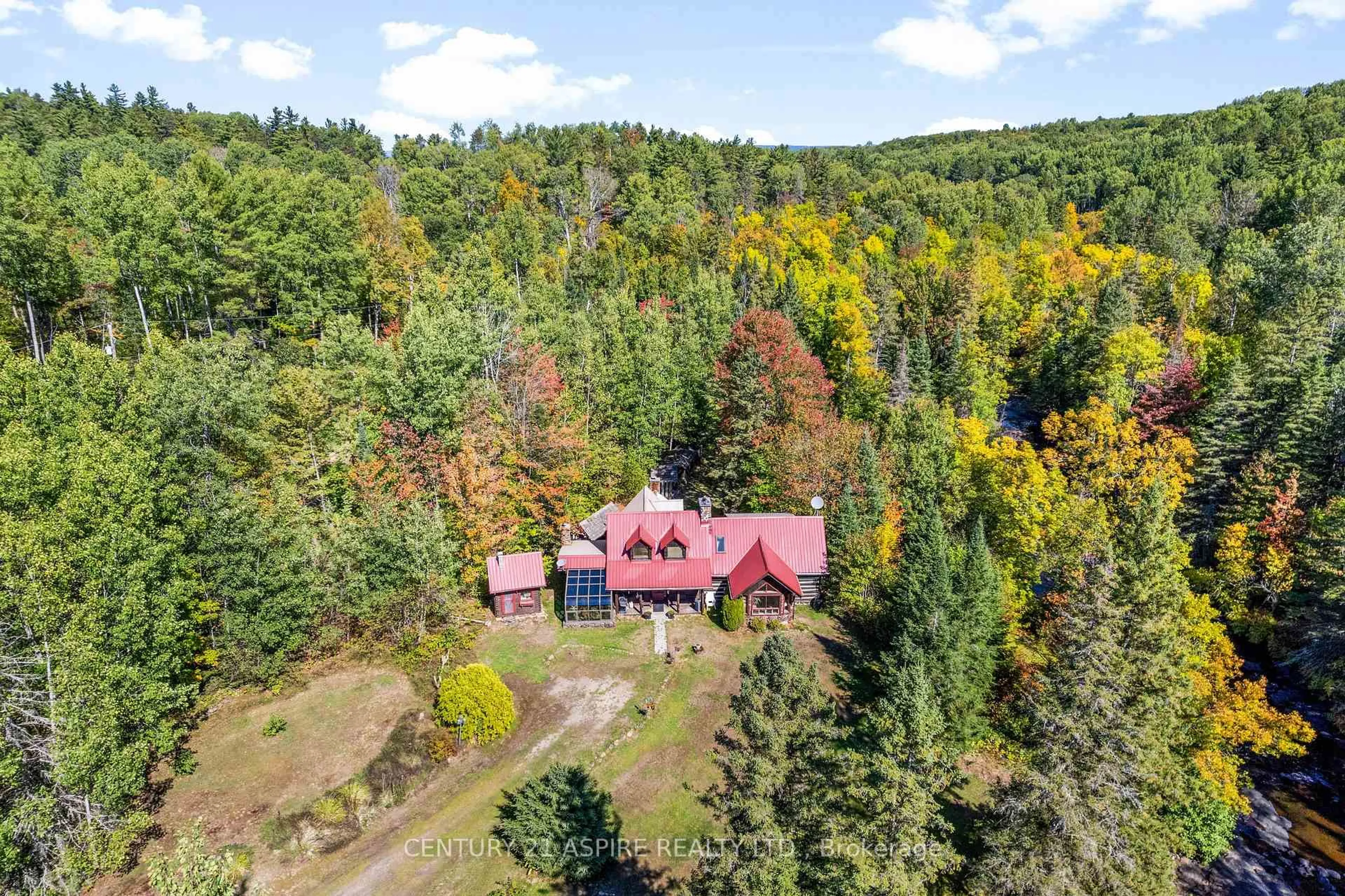 A pic from outside/outdoor area/front of a property/back of a property/a pic from drone, forest/trees view for 3050 Paugh Lake Rd, Barry's Bay Ontario K0J 1B0