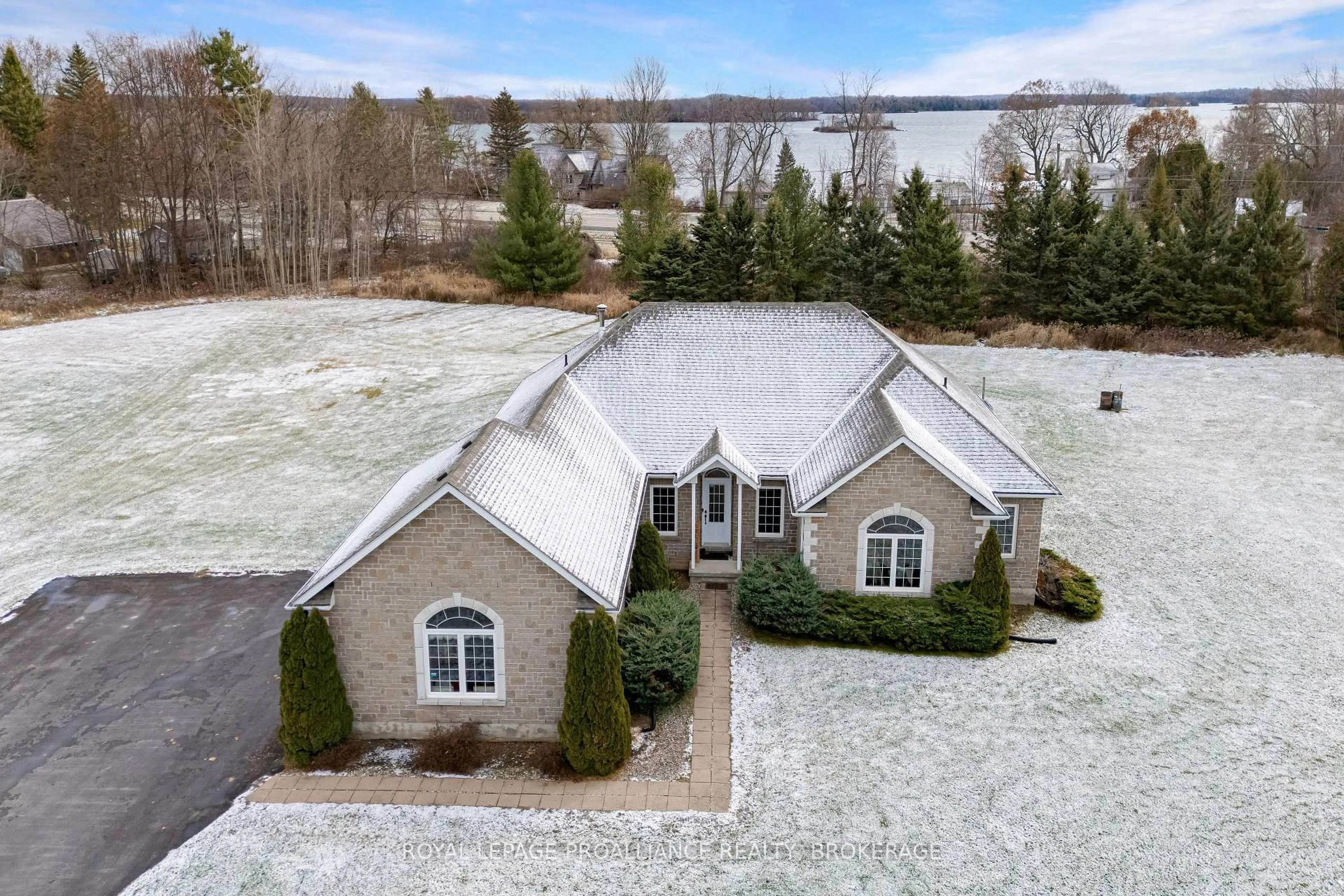 A pic from outside/outdoor area/front of a property/back of a property/a pic from drone, unknown for 61 Conner Dr, Gananoque Ontario K7G 2V4