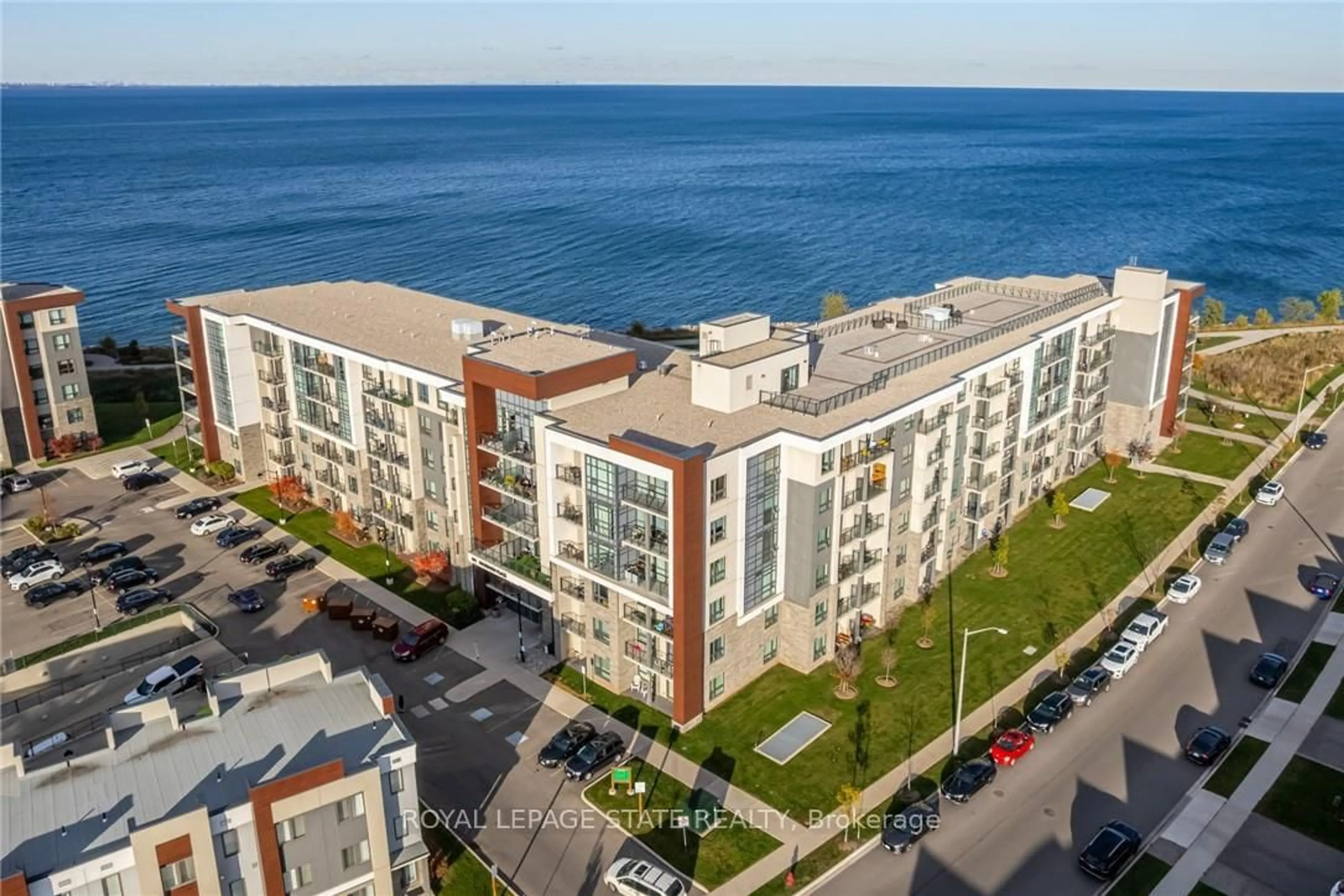 A pic from outside/outdoor area/front of a property/back of a property/a pic from drone, water/lake/river/ocean view for 101 Shoreview Pl #123, Hamilton Ontario L8E 0K2