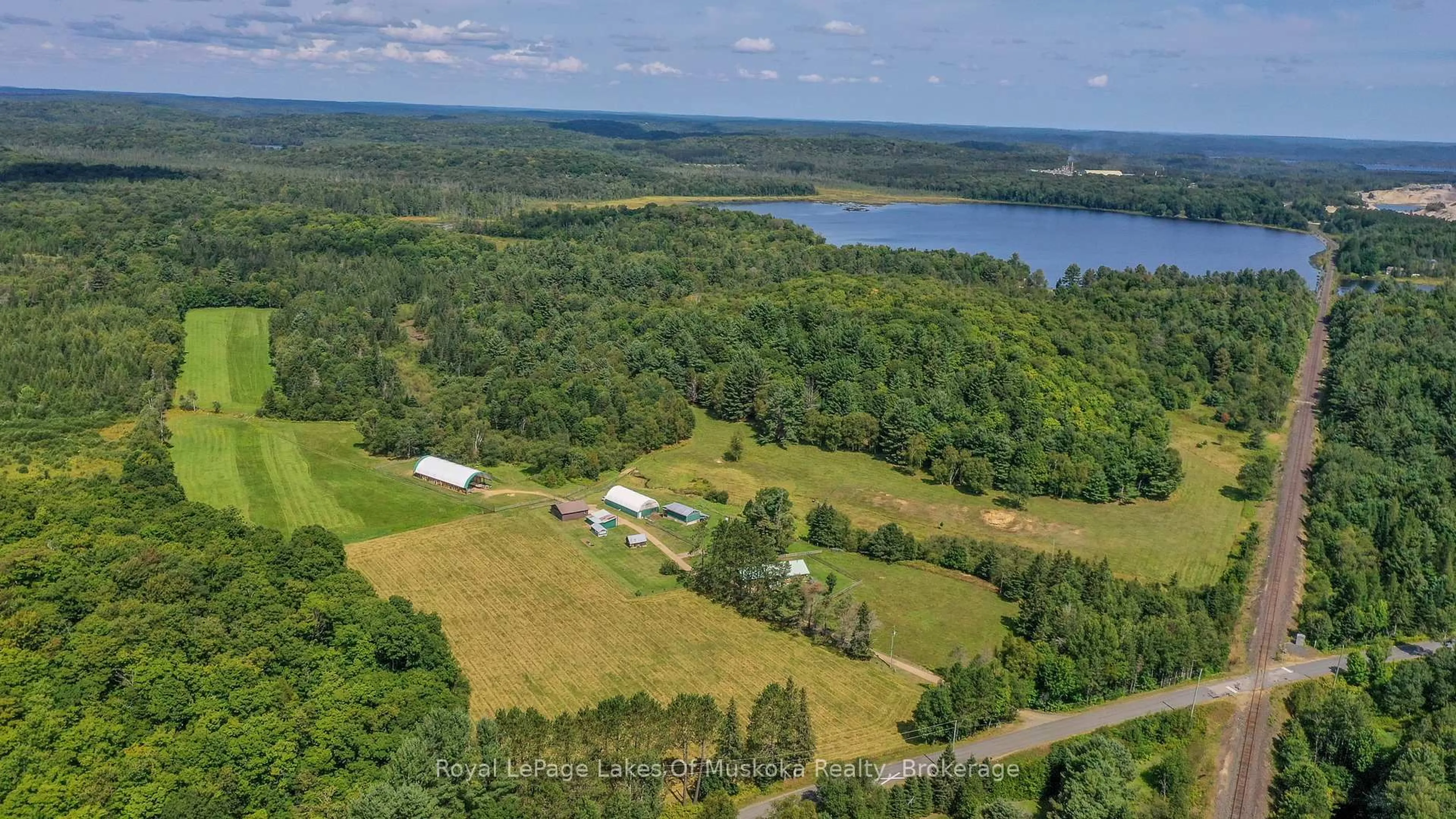 A pic from outside/outdoor area/front of a property/back of a property/a pic from drone, water/lake/river/ocean view for 214 NORTH LANCELOT Rd, Huntsville Ontario P0B 1M0