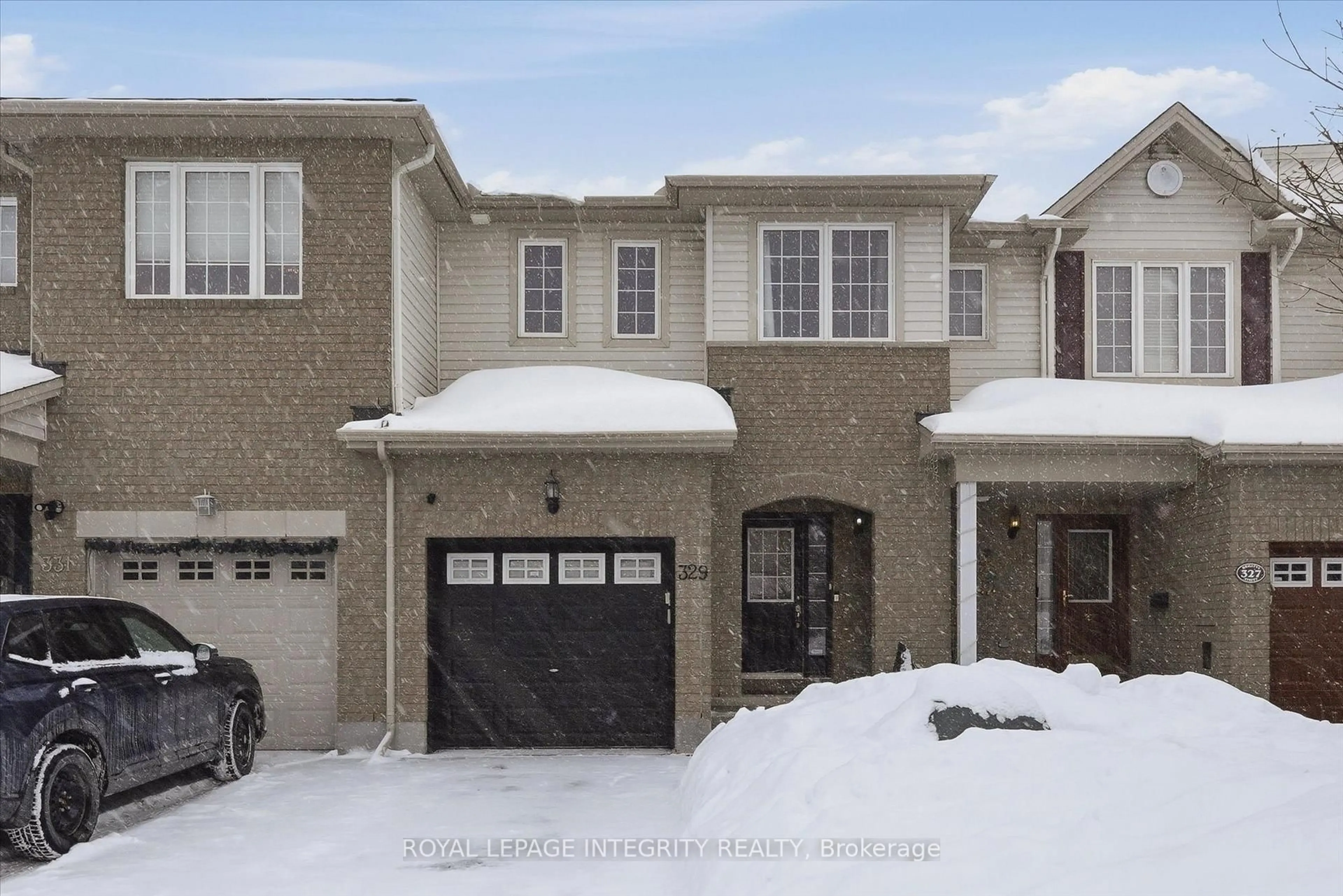 Home with brick exterior material, street for 329 Brigitta St, Ottawa Ontario K2S 0H9