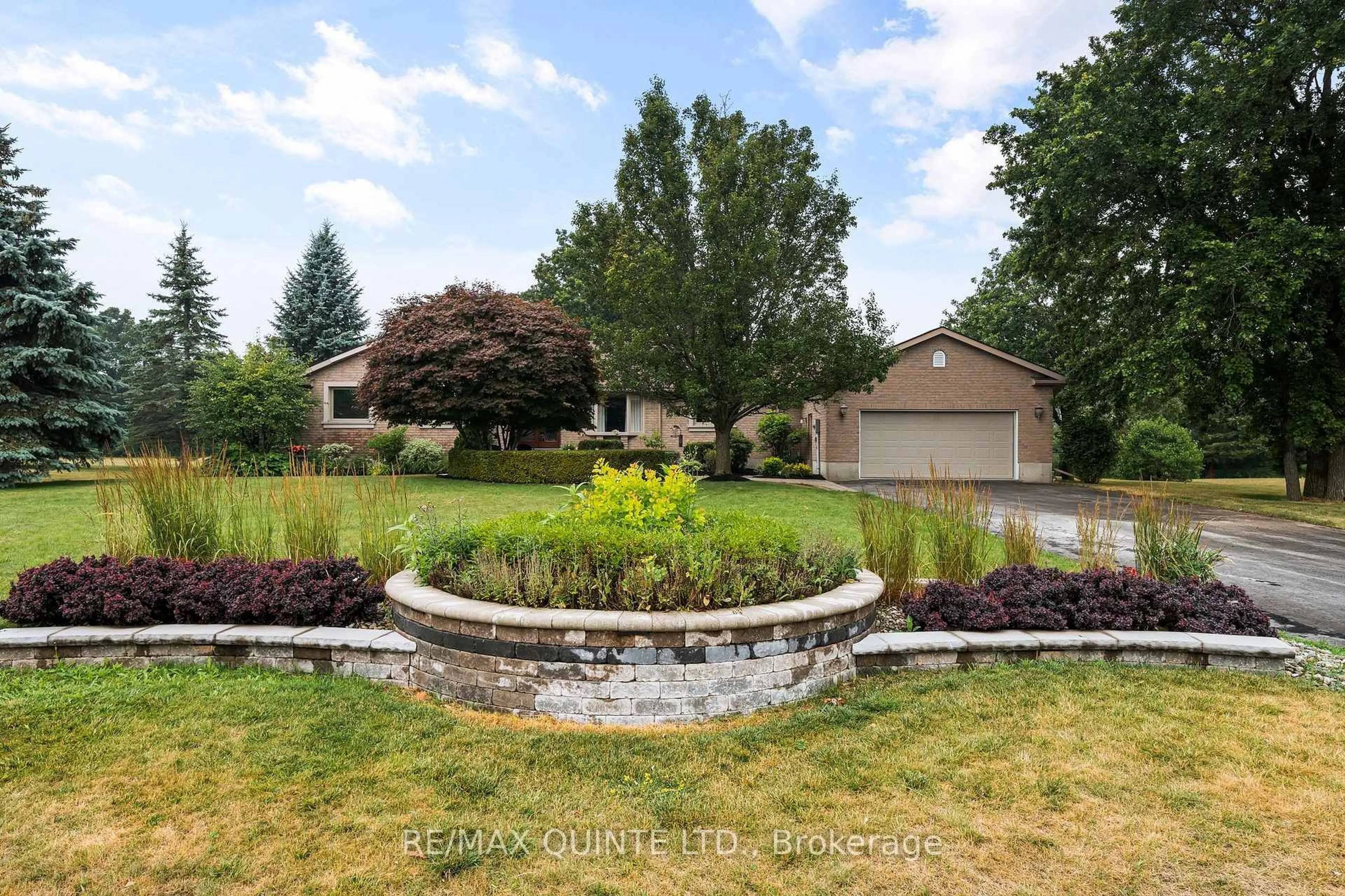 A pic from outside/outdoor area/front of a property/back of a property/a pic from drone, unknown for 100 Bay Breeze St, Prince Edward County Ontario K8N 0L4