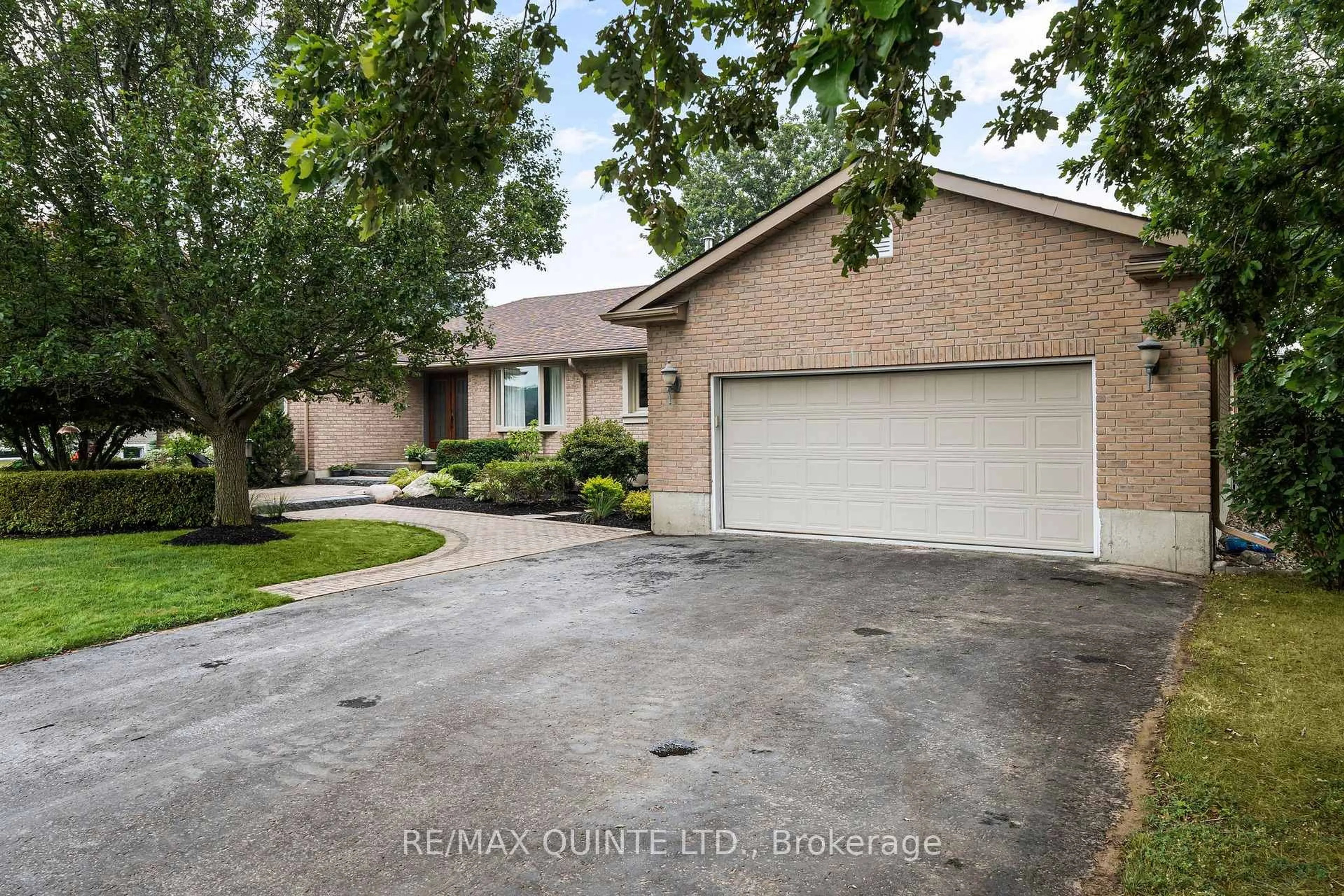 Home with brick exterior material, street for 100 Bay Breeze St, Prince Edward County Ontario K8N 0L4