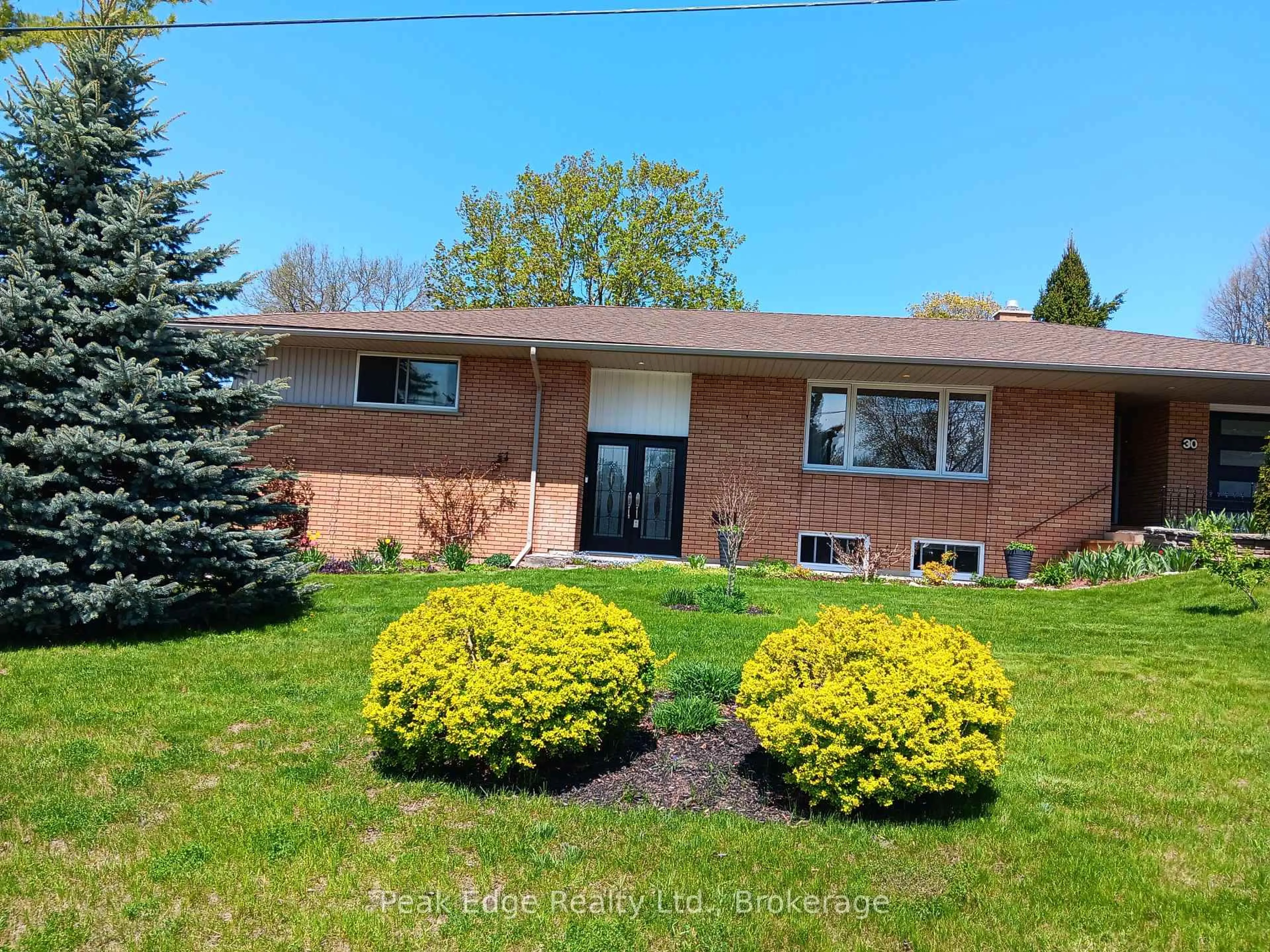 Home with brick exterior material, street for 30 7TH St, Hanover Ontario N4N 1G2