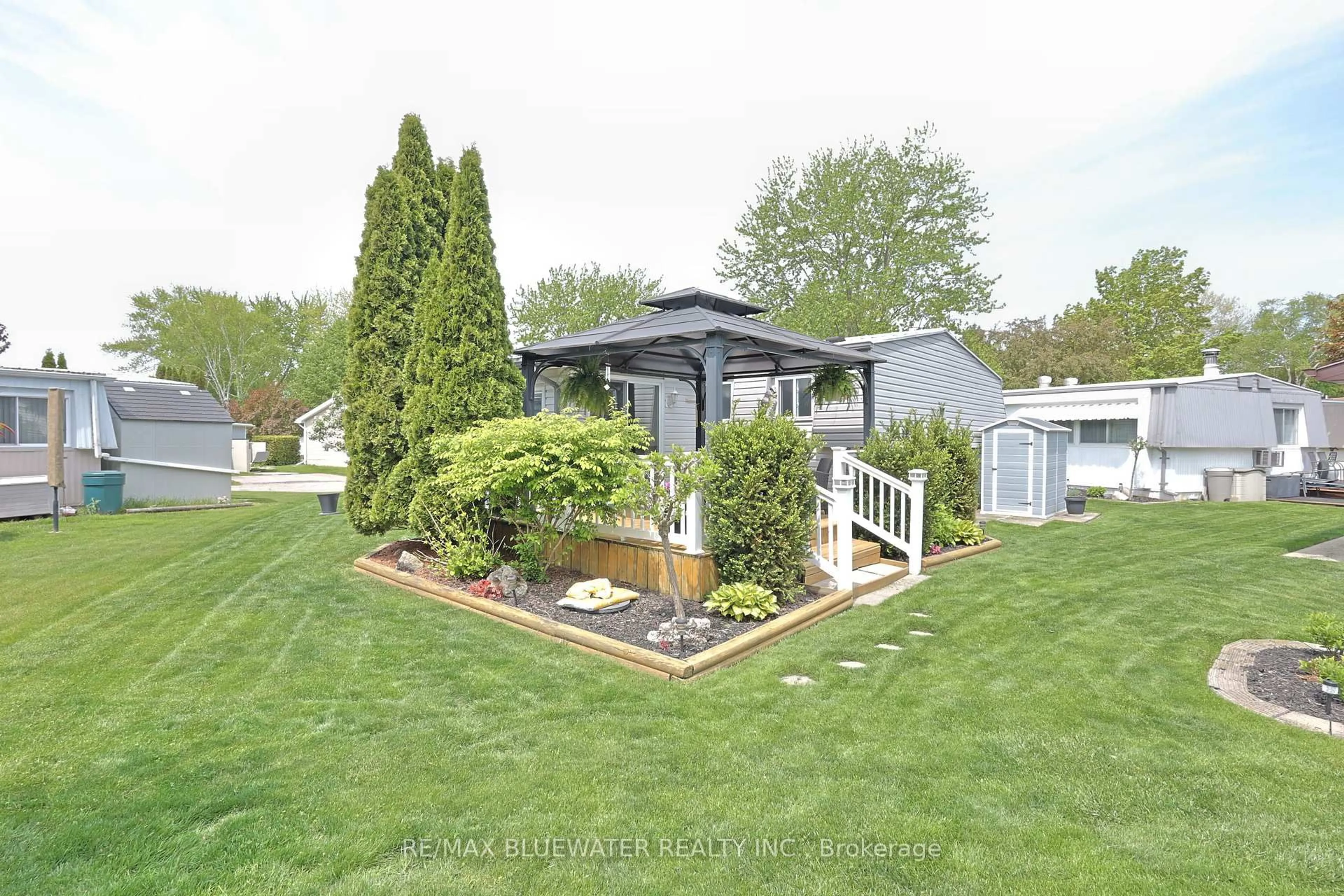 A pic from outside/outdoor area/front of a property/back of a property/a pic from drone, unknown for 209 Biltmore Dr, South Huron Ontario N0M 1T0