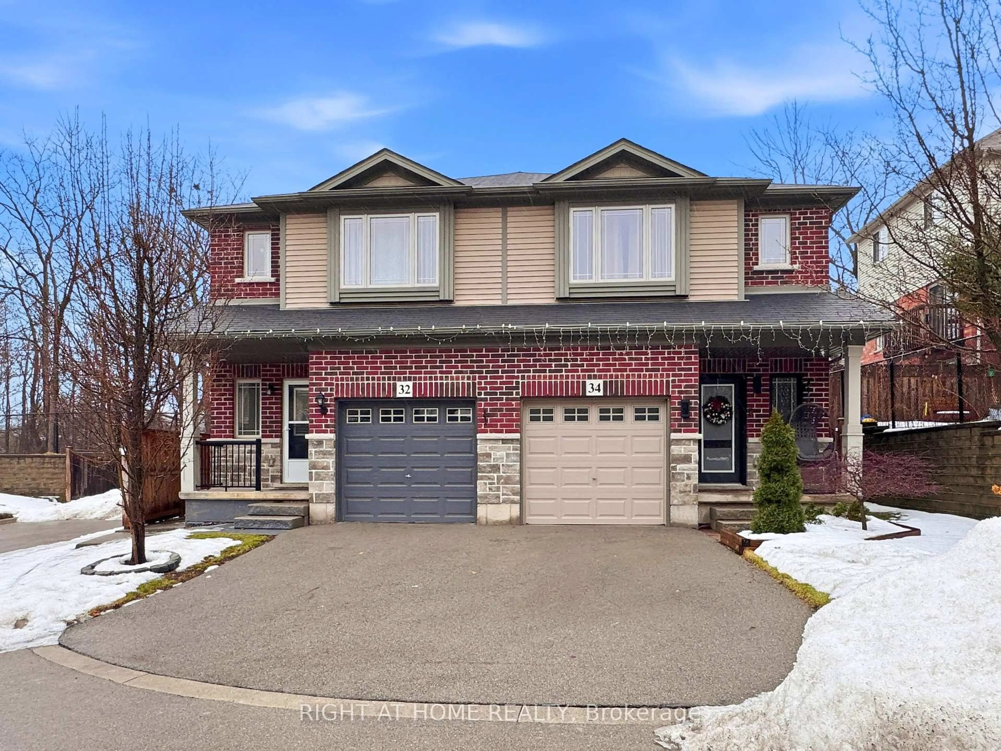 Home with brick exterior material, street for 32 Rolling Lane, Hamilton Ontario L8K 0A1