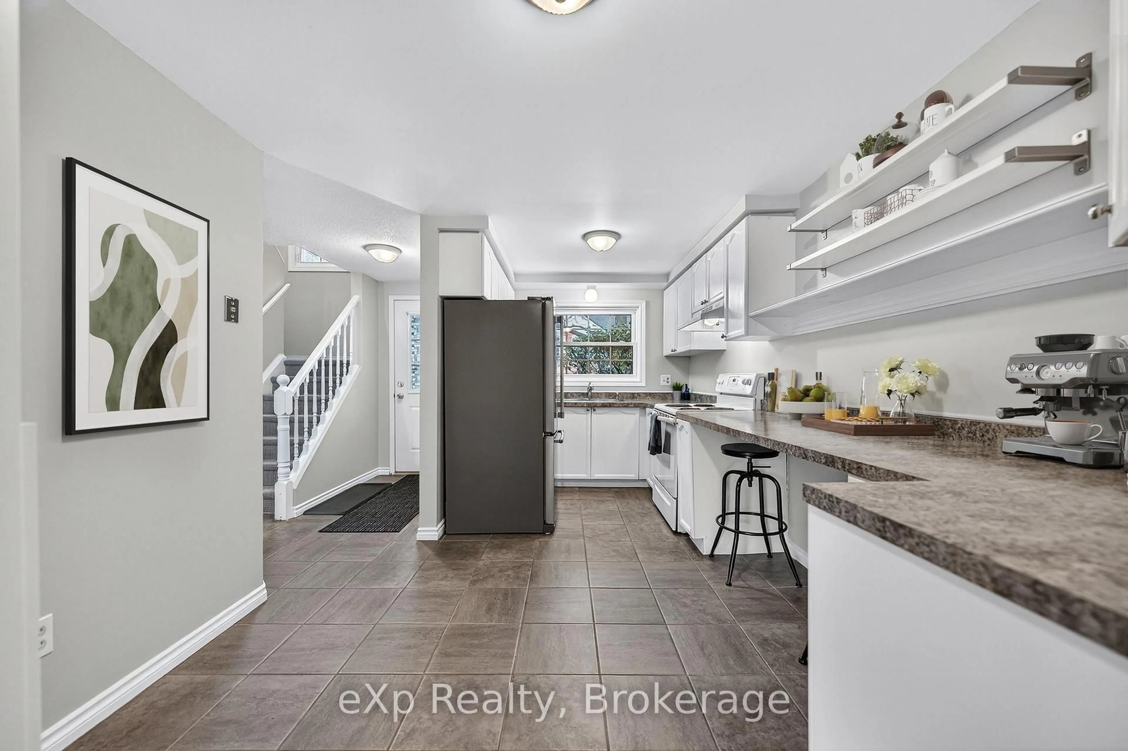 Open concept kitchen, ceramic/tile floor for 129 Victoria Rd #75, Guelph Ontario N1E 6V4