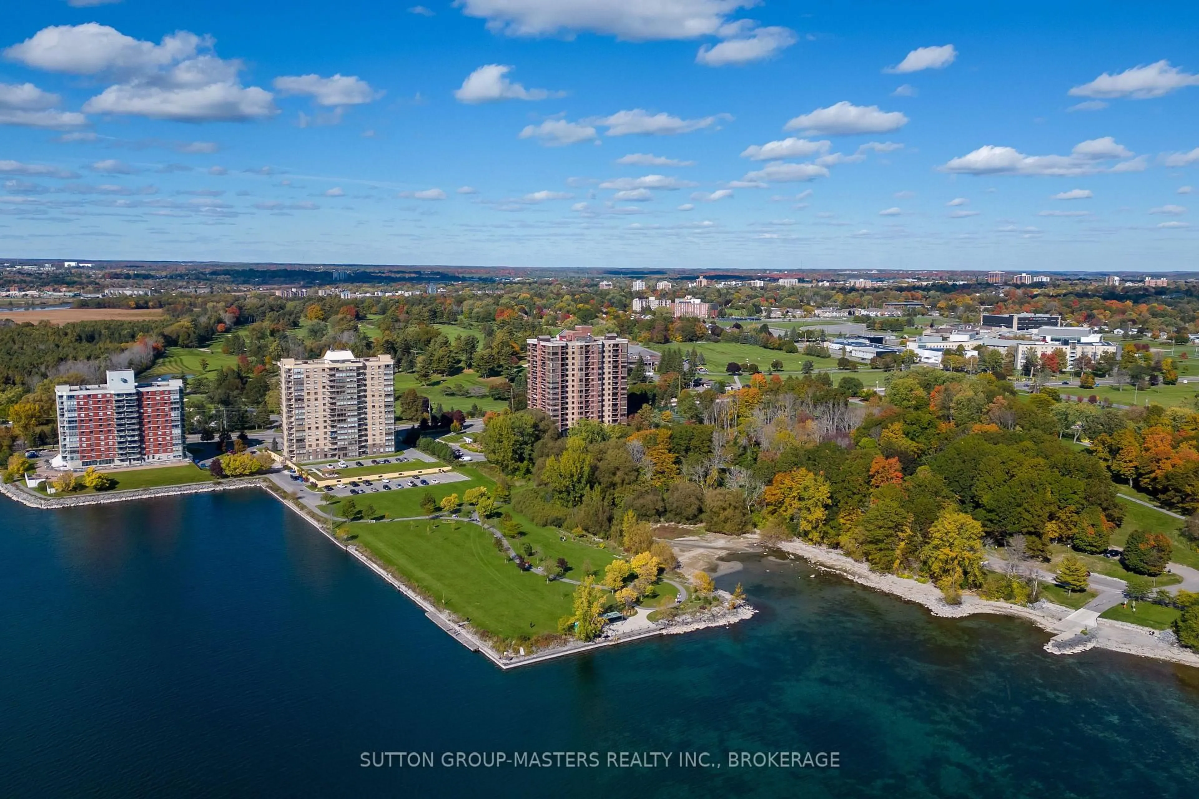 A pic from outside/outdoor area/front of a property/back of a property/a pic from drone, water/lake/river/ocean view for 1000 King St #406, Kingston Ontario K7M 8H3