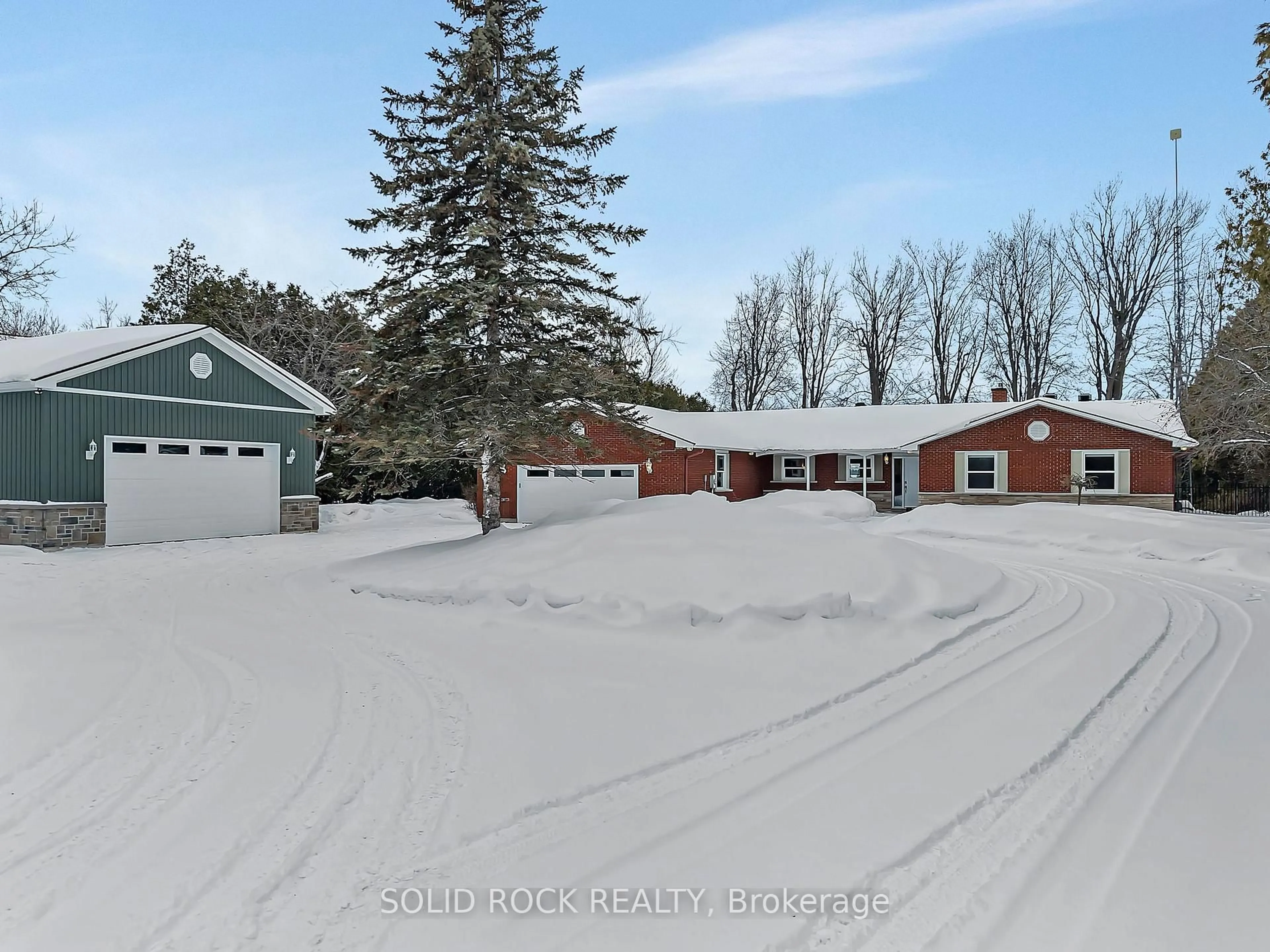 A pic from outside/outdoor area/front of a property/back of a property/a pic from drone, street for 3710 River Rd, North Grenville Ontario K4M 1B4