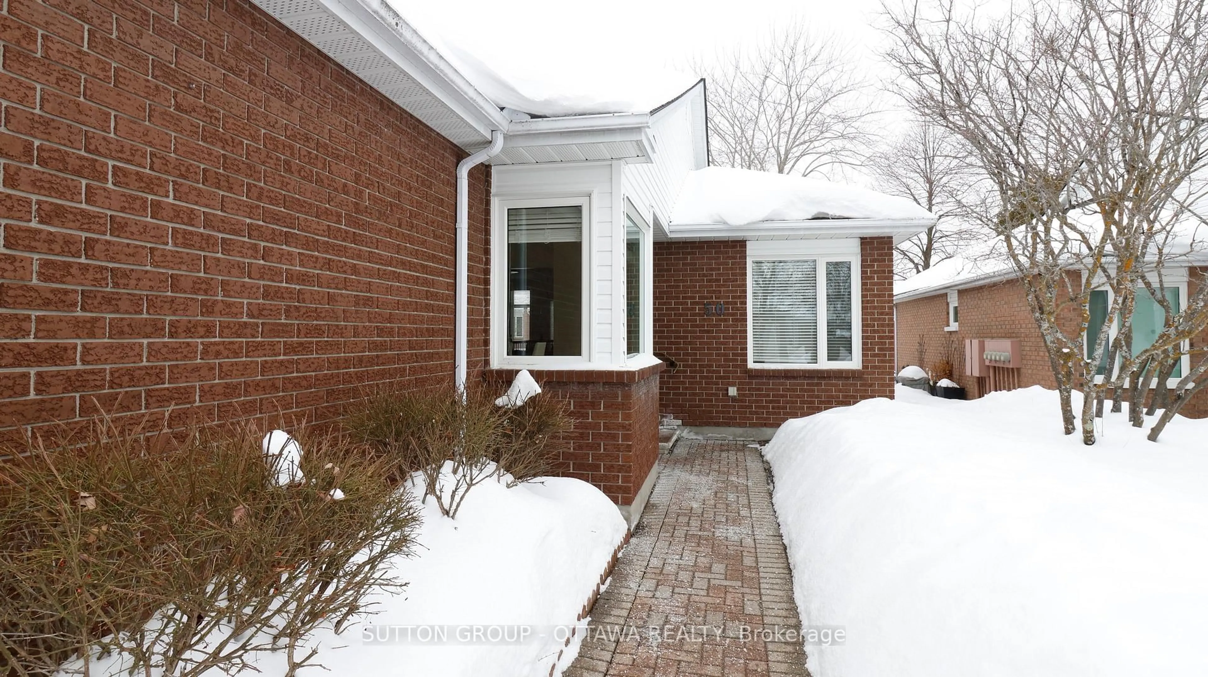 Home with brick exterior material, street for 50 Grand Cedar Crt, Ottawa Ontario K2S 1G5