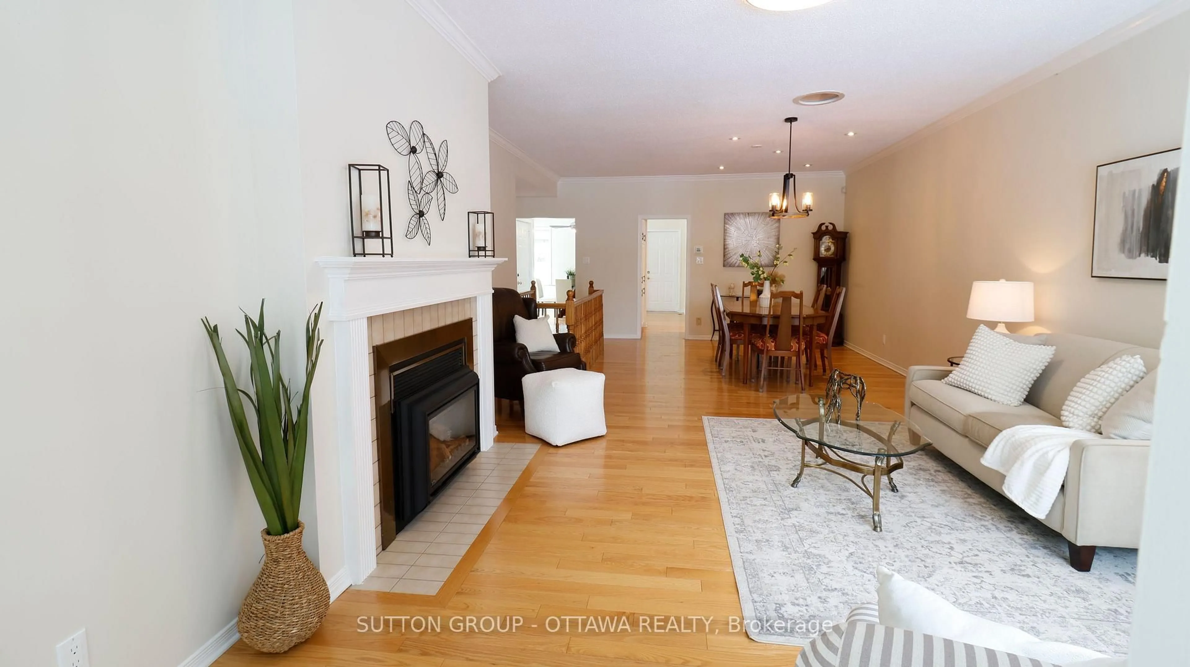 Living room with furniture, wood/laminate floor for 50 Grand Cedar Crt, Ottawa Ontario K2S 1G5