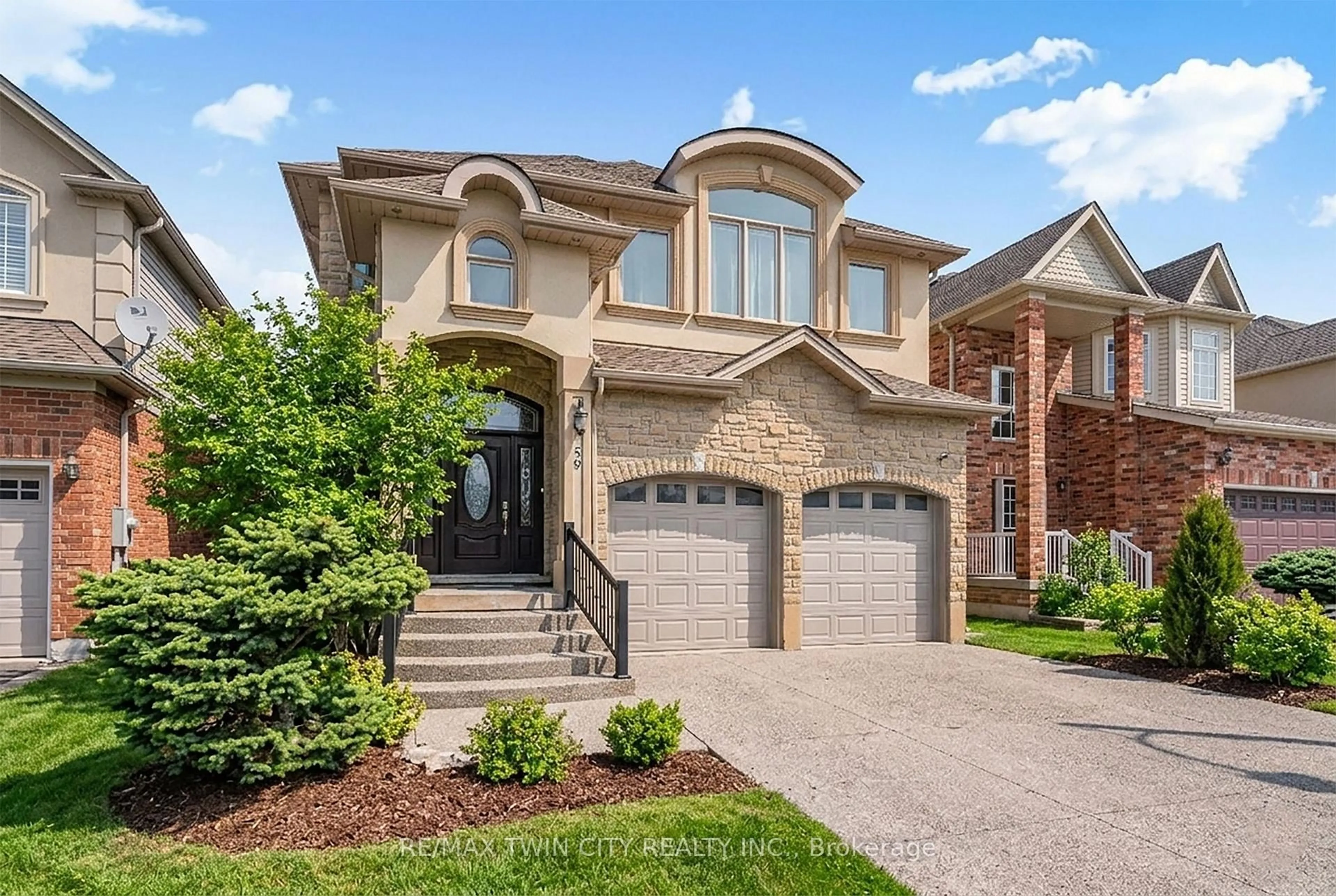 Home with brick exterior material, street for 59 Newcastle Dr, Kitchener Ontario N2R 1X2