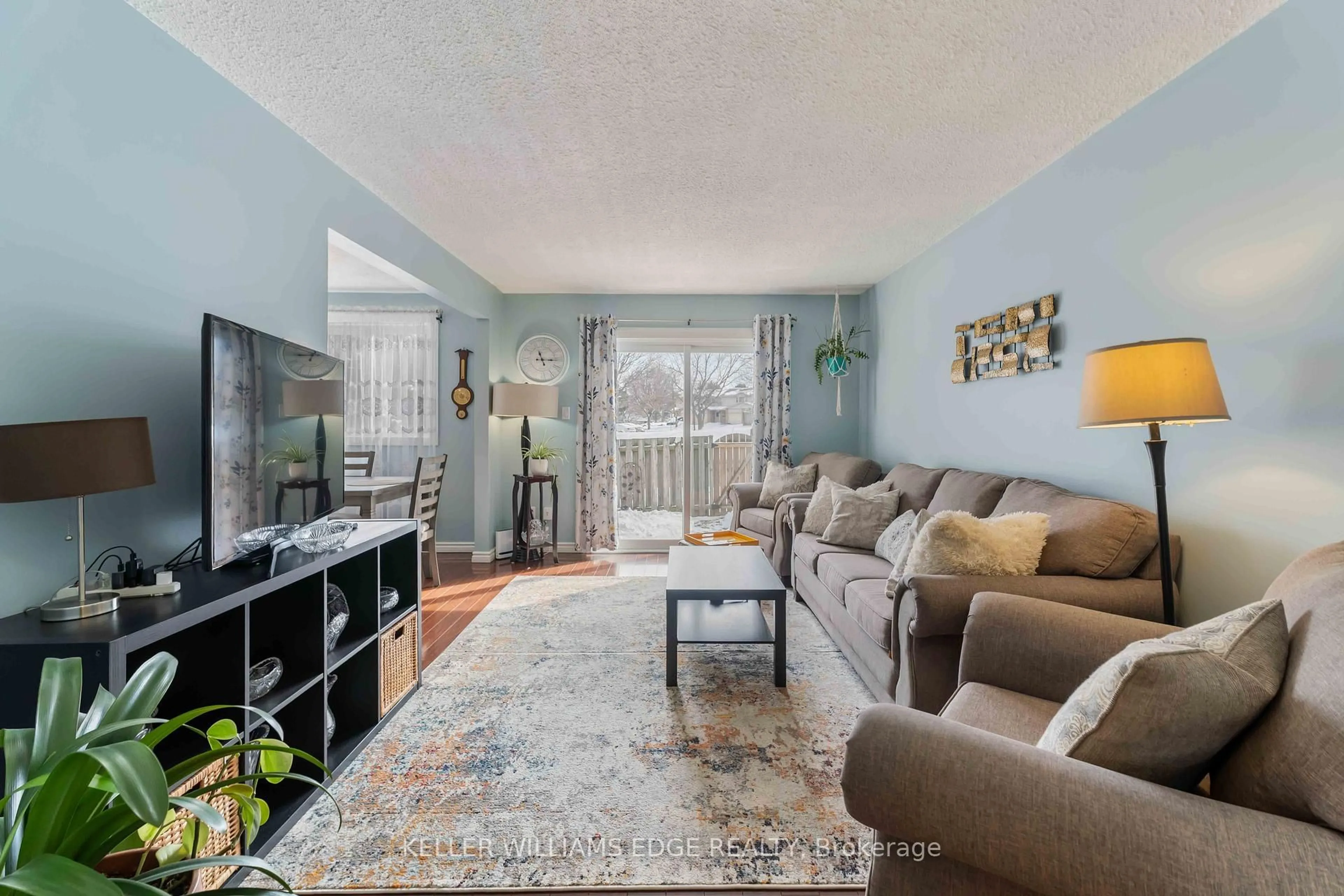 Living room with furniture, unknown for 300 Rexford Dr #22, Hamilton Ontario L8W 1P5