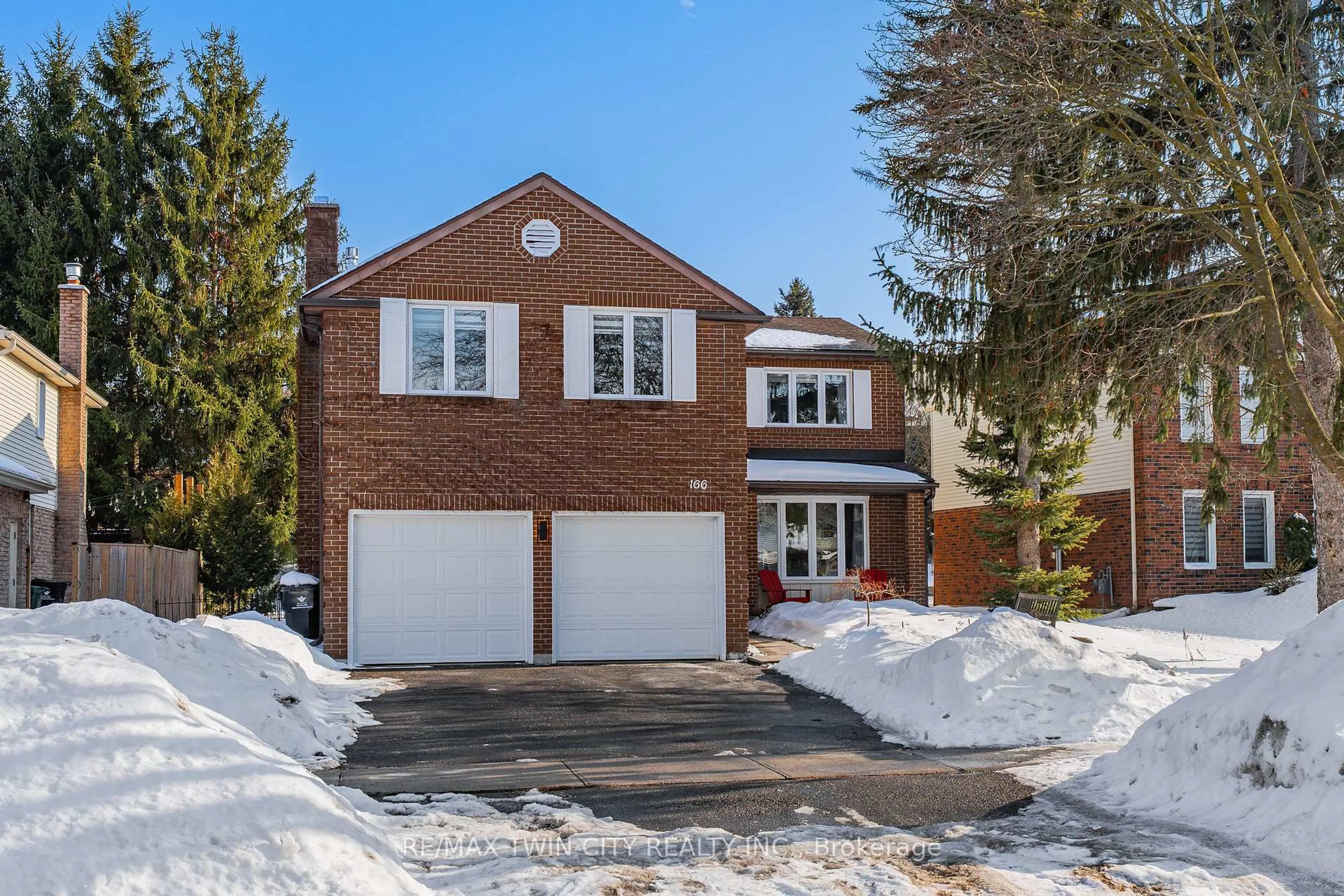Home with brick exterior material, street for 166 Westvale Dr, Waterloo Ontario N2T 1C2