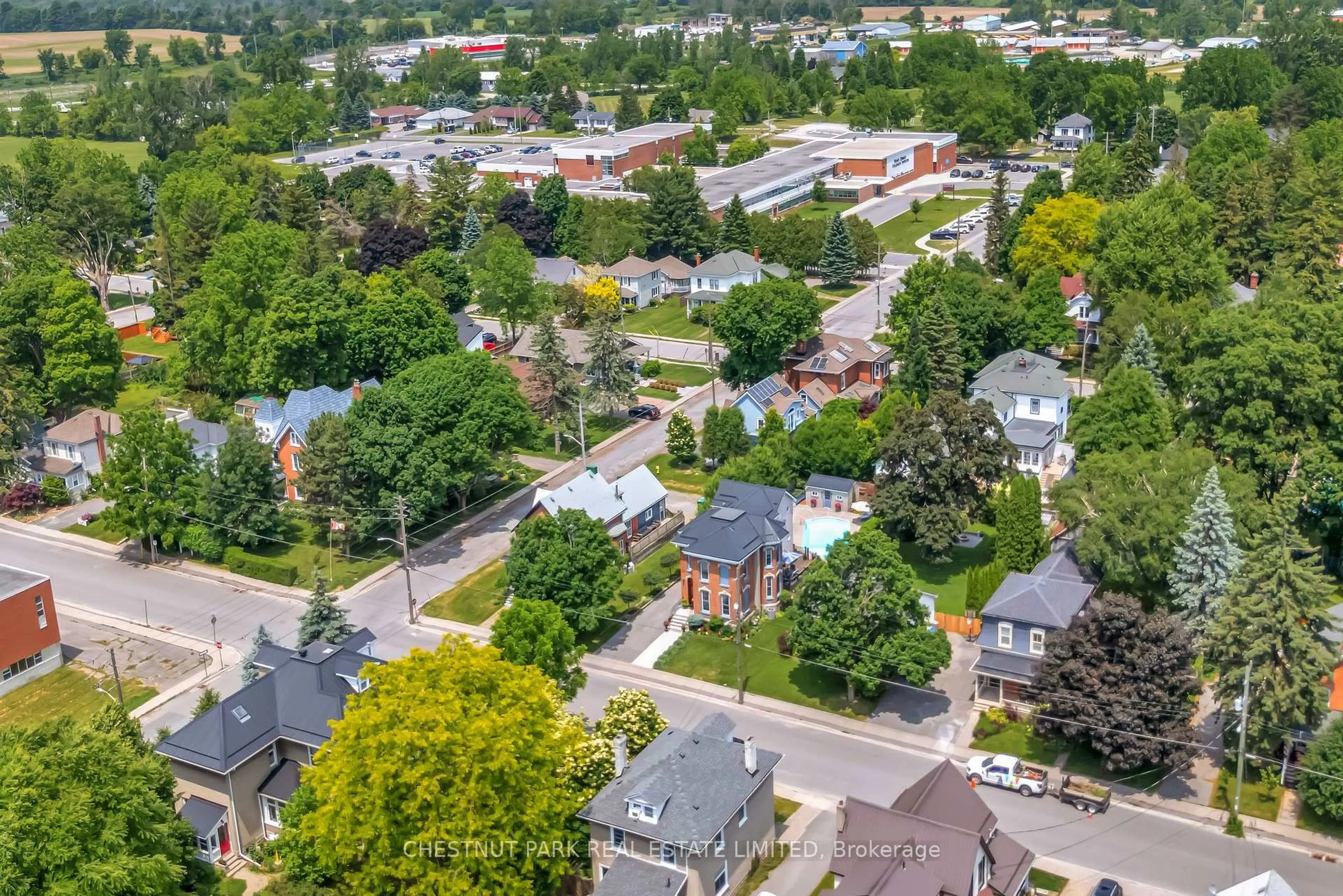 A pic from outside/outdoor area/front of a property/back of a property/a pic from drone, street for 26 Centre St, Prince Edward County Ontario K0K 2T0
