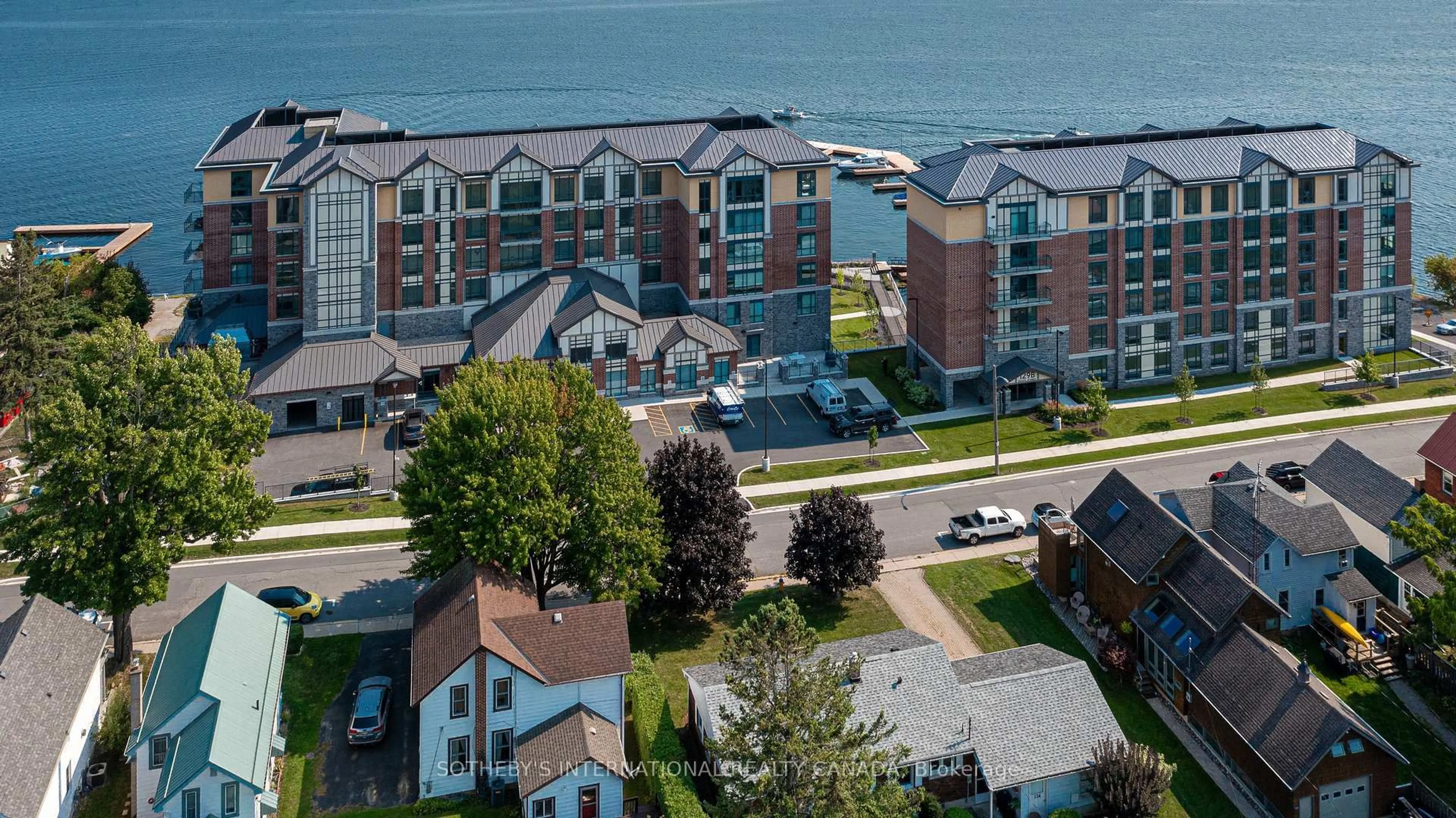 A pic from outside/outdoor area/front of a property/back of a property/a pic from drone, water/lake/river/ocean view for 129B South St #221, Gananoque Ontario K7G 0B1