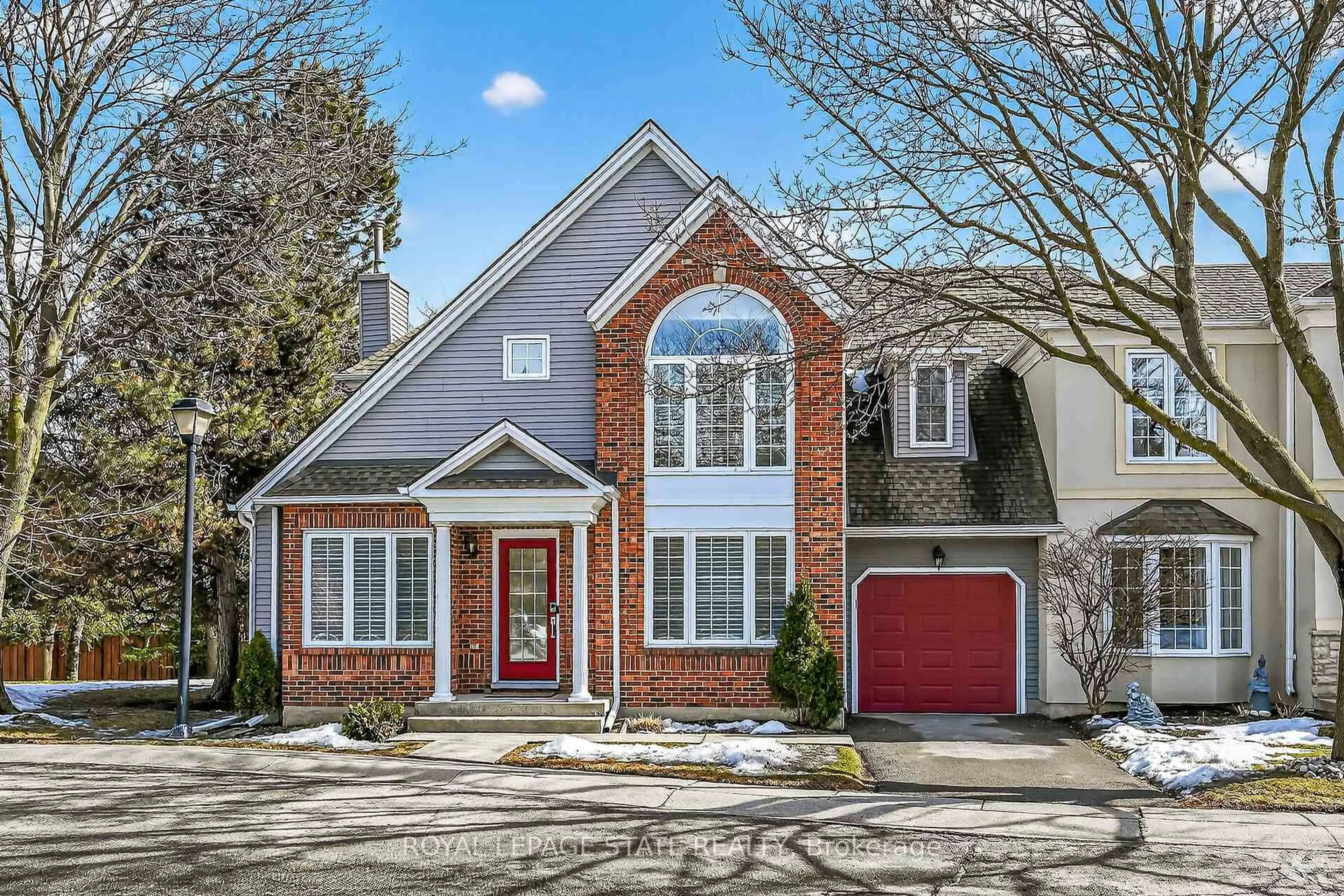 Home with brick exterior material, street for 334 Wilson St #12, Hamilton Ontario L9G 1N5