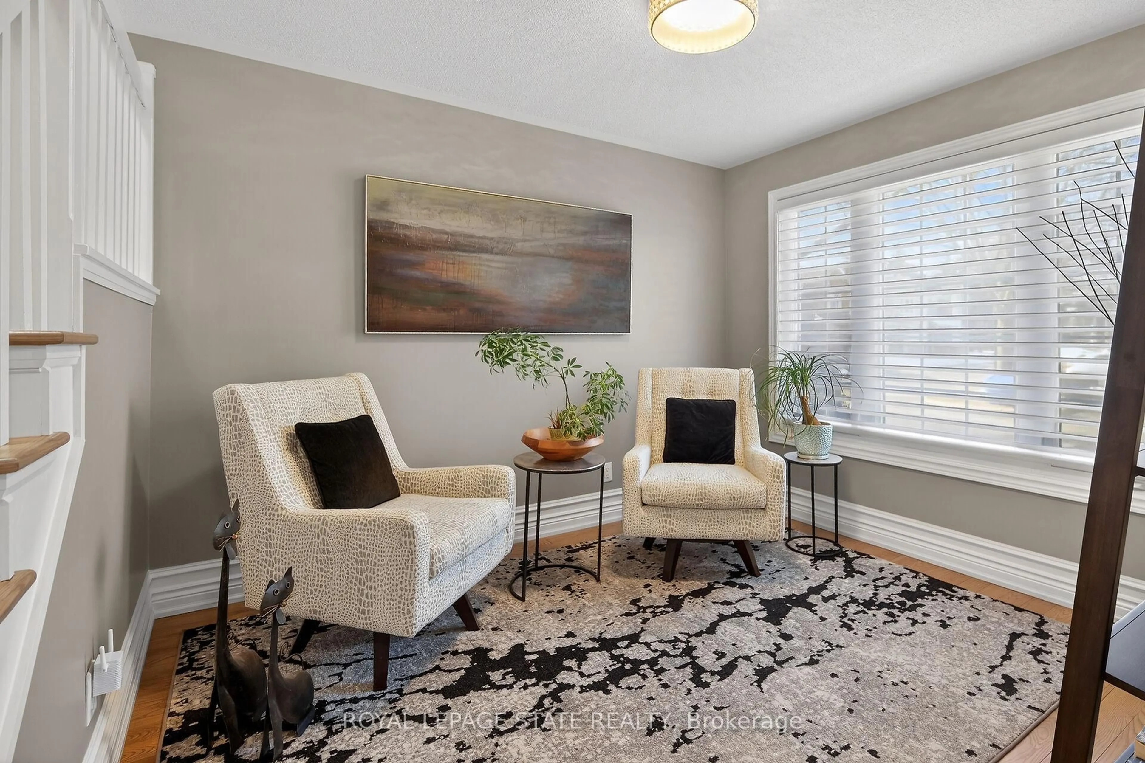 Living room with furniture, carpet floor for 334 Wilson St #12, Hamilton Ontario L9G 1N5