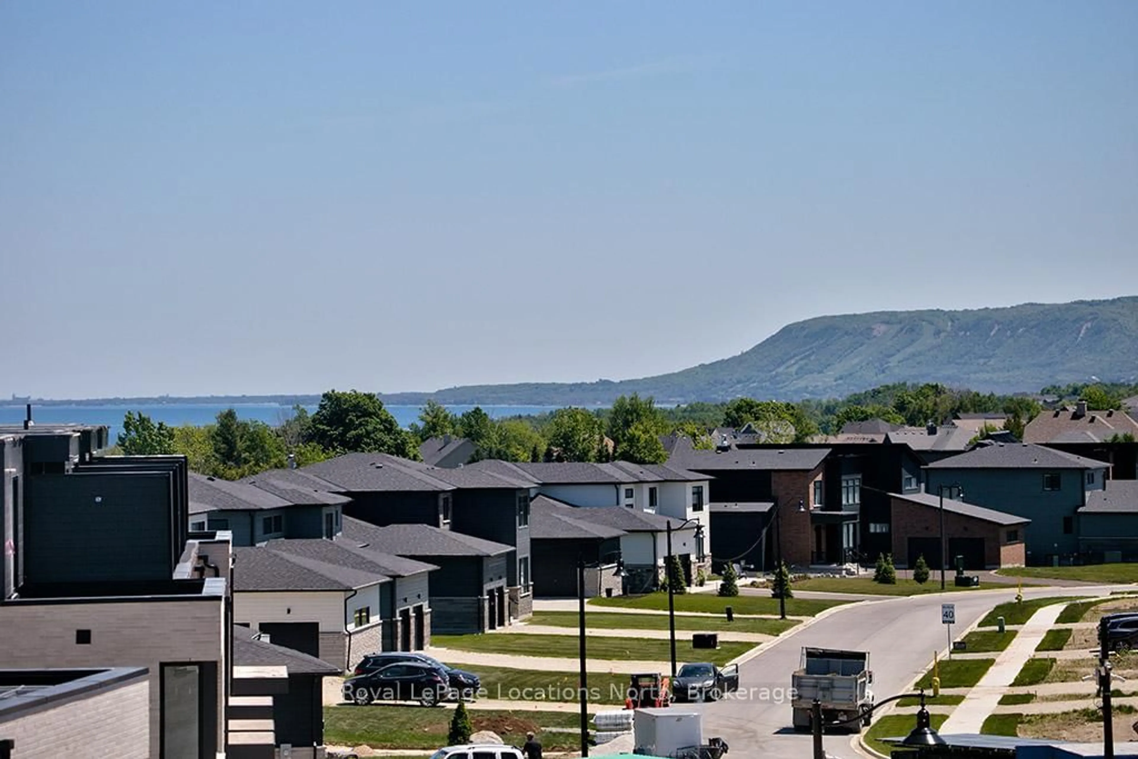 A pic from outside/outdoor area/front of a property/back of a property/a pic from drone, mountain view for 117 Sladden Crt #18, Blue Mountains Ontario N0H 2P0