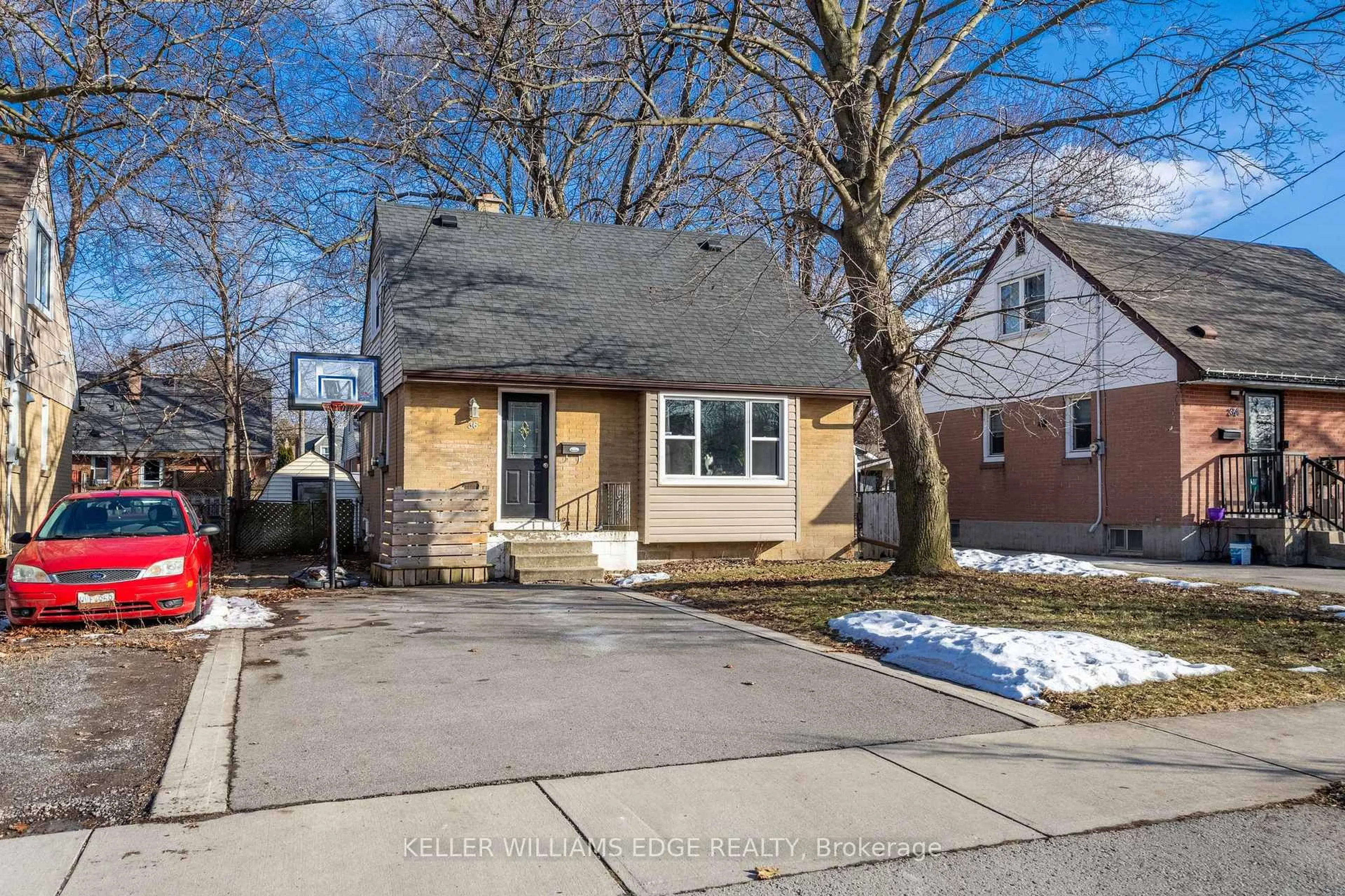 Home with brick exterior material, street for 36 Blair Ave, Hamilton Ontario L8H 6E7