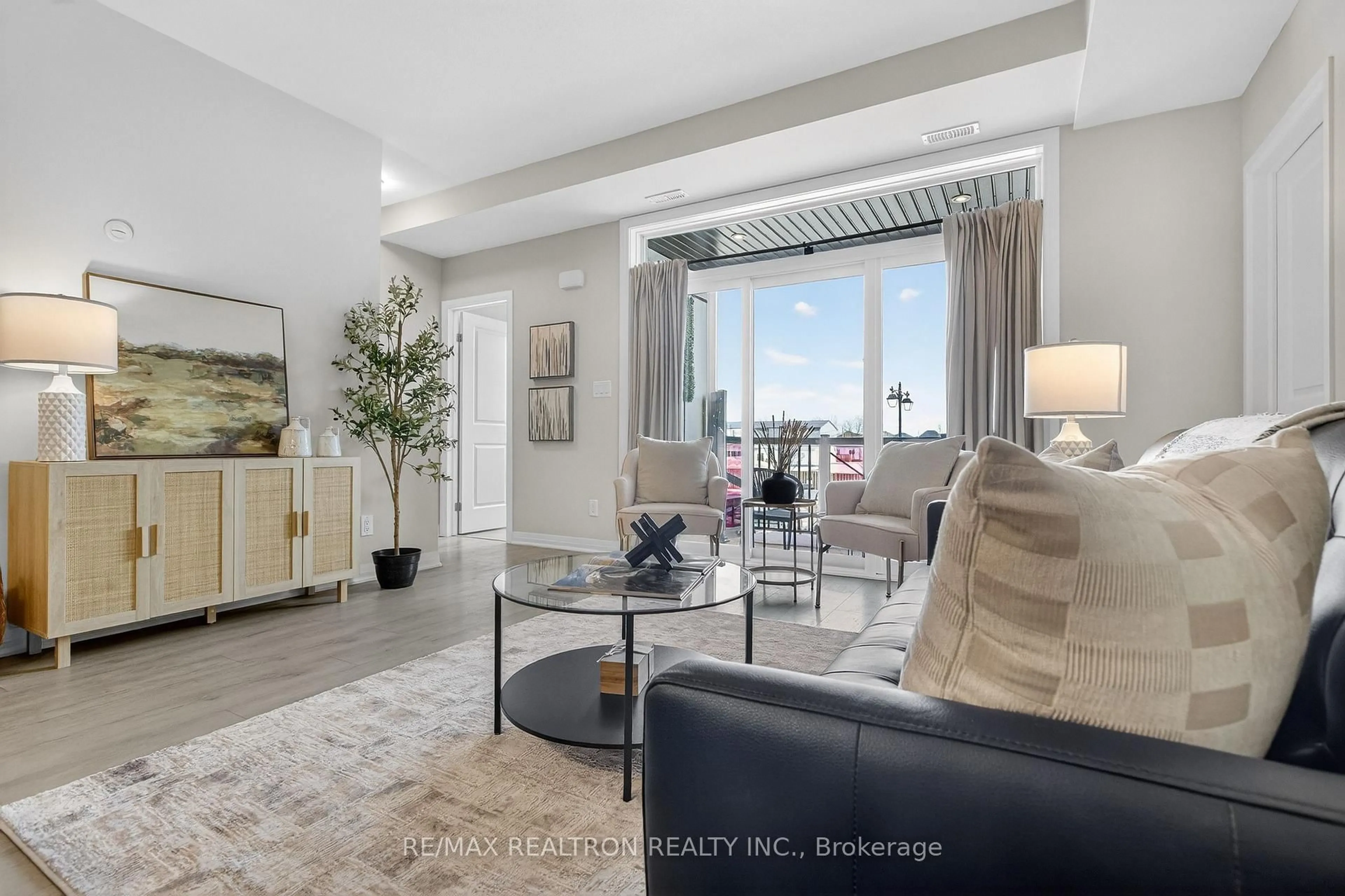 Living room with furniture, unknown for 155 Thomas Slee Dr #2K, Kitchener Ontario N2P 0J8