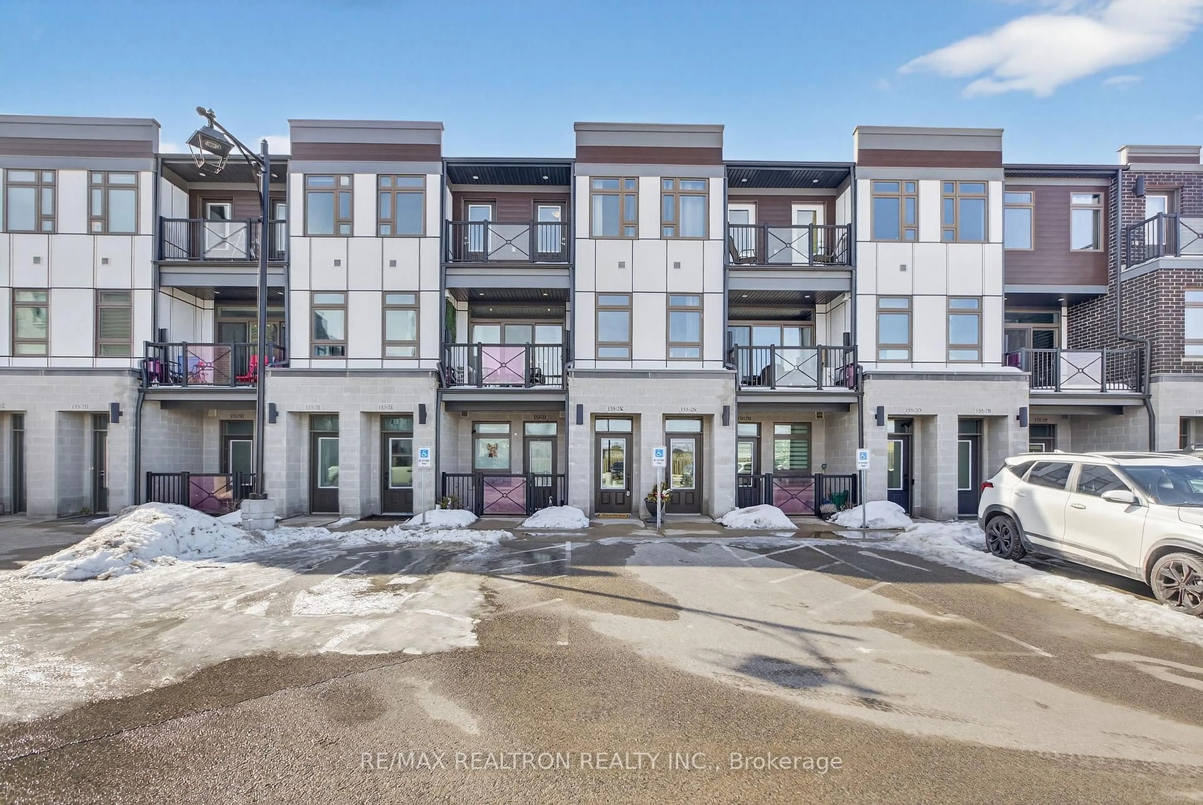 A pic from outside/outdoor area/front of a property/back of a property/a pic from drone, street for 155 Thomas Slee Dr #2K, Kitchener Ontario N2P 0J8