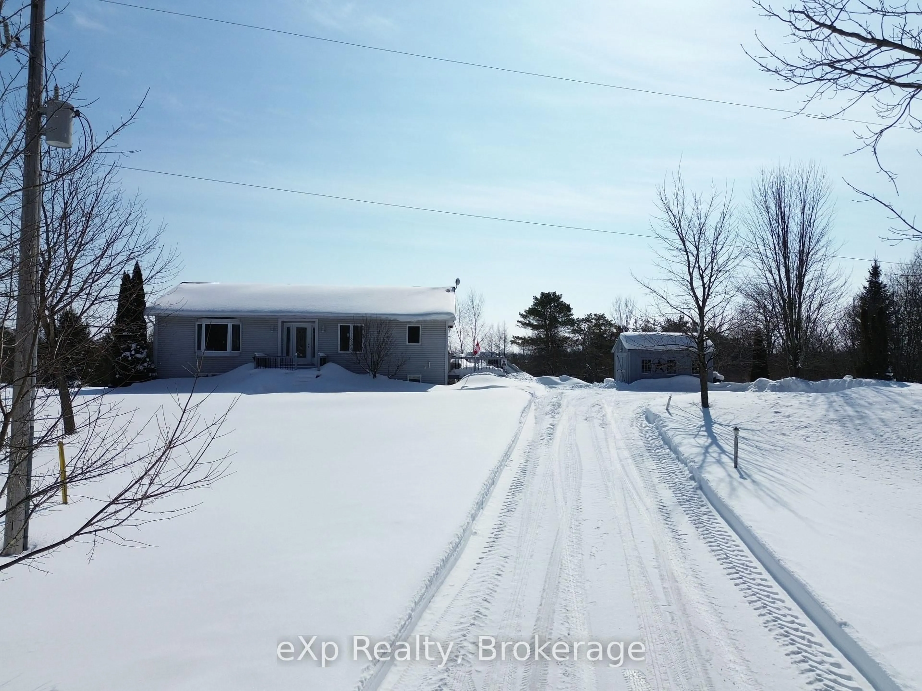 A pic from outside/outdoor area/front of a property/back of a property/a pic from drone, street for 585206 10A Sdrd, Grey Highlands Ontario K7S 3G7