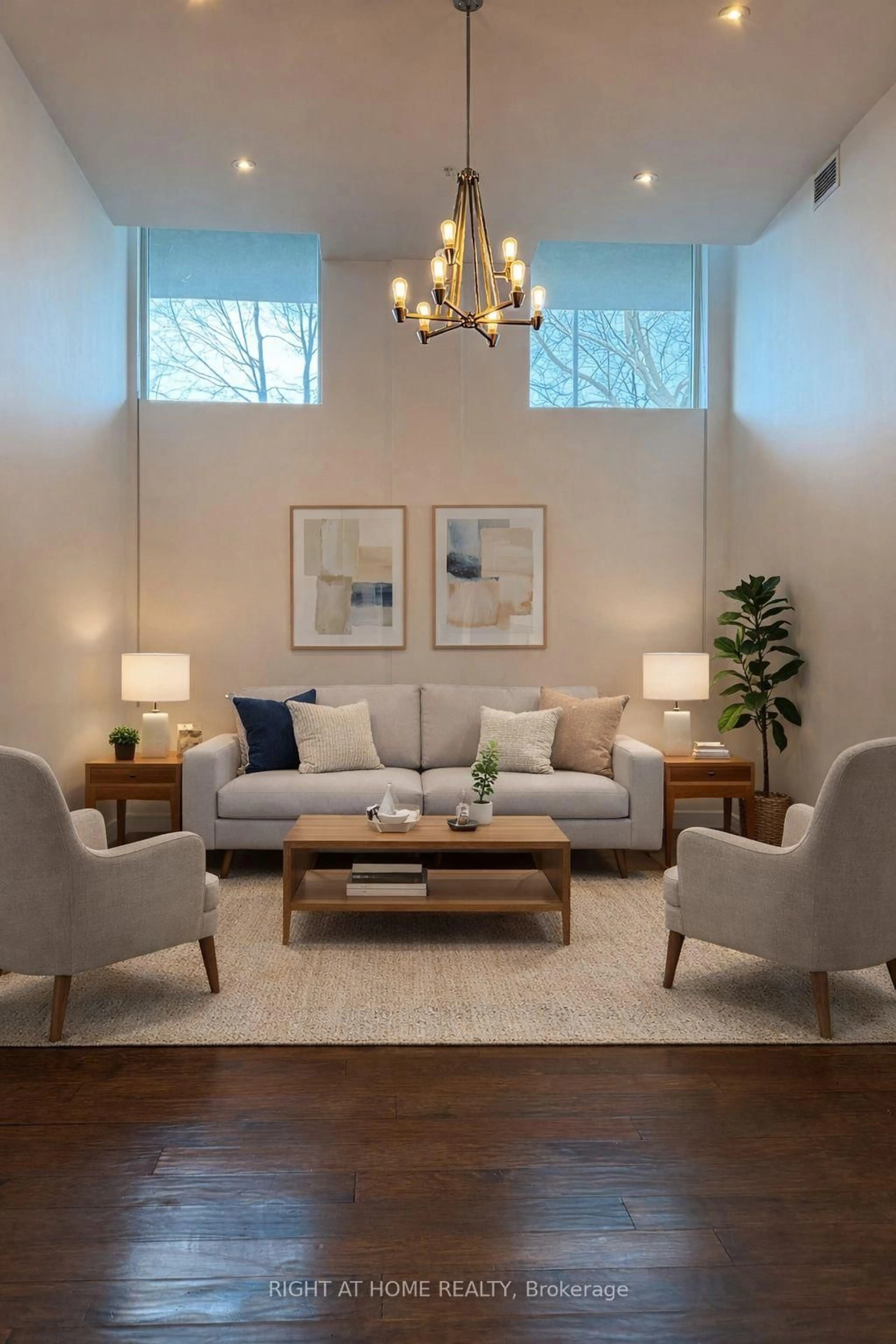 Living room with furniture, wood/laminate floor for 50 Murray St #102, Hamilton Ontario L8L 1B3