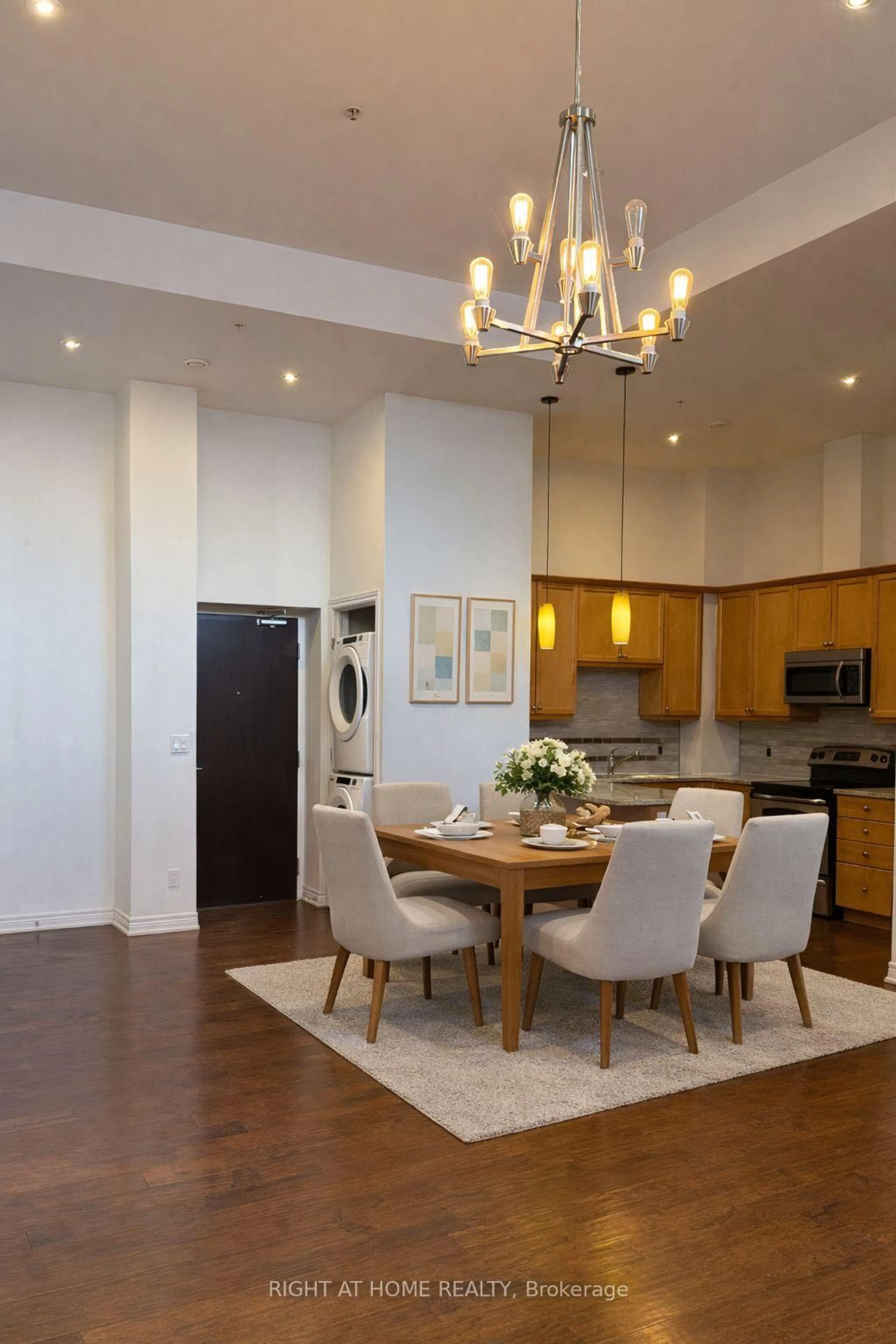 Dining room, wood/laminate floor for 50 Murray St #102, Hamilton Ontario L8L 1B3