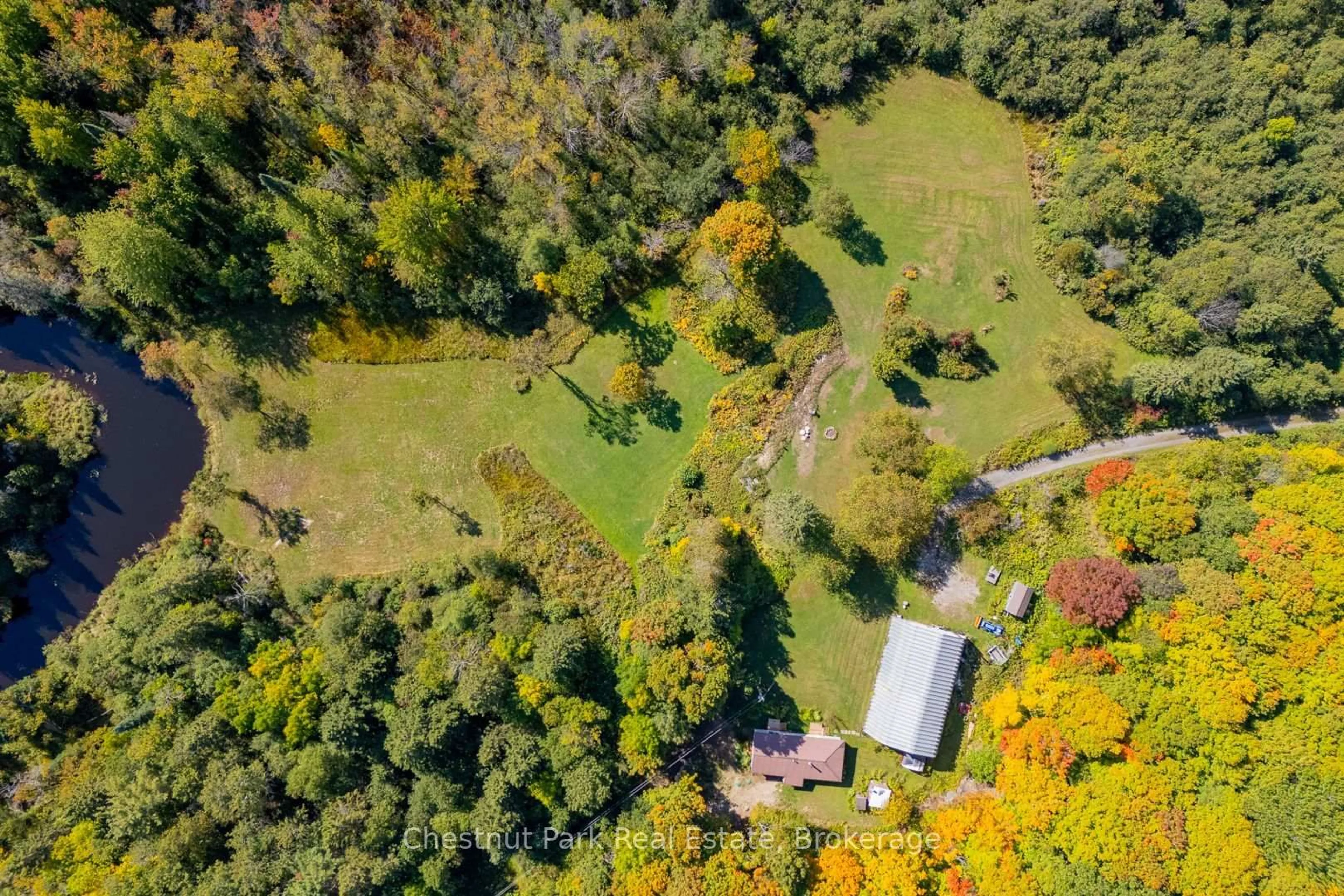 A pic from outside/outdoor area/front of a property/back of a property/a pic from drone, forest/trees view for 1190 Hekkla Rd, Muskoka Lakes Ontario P0C 1J0