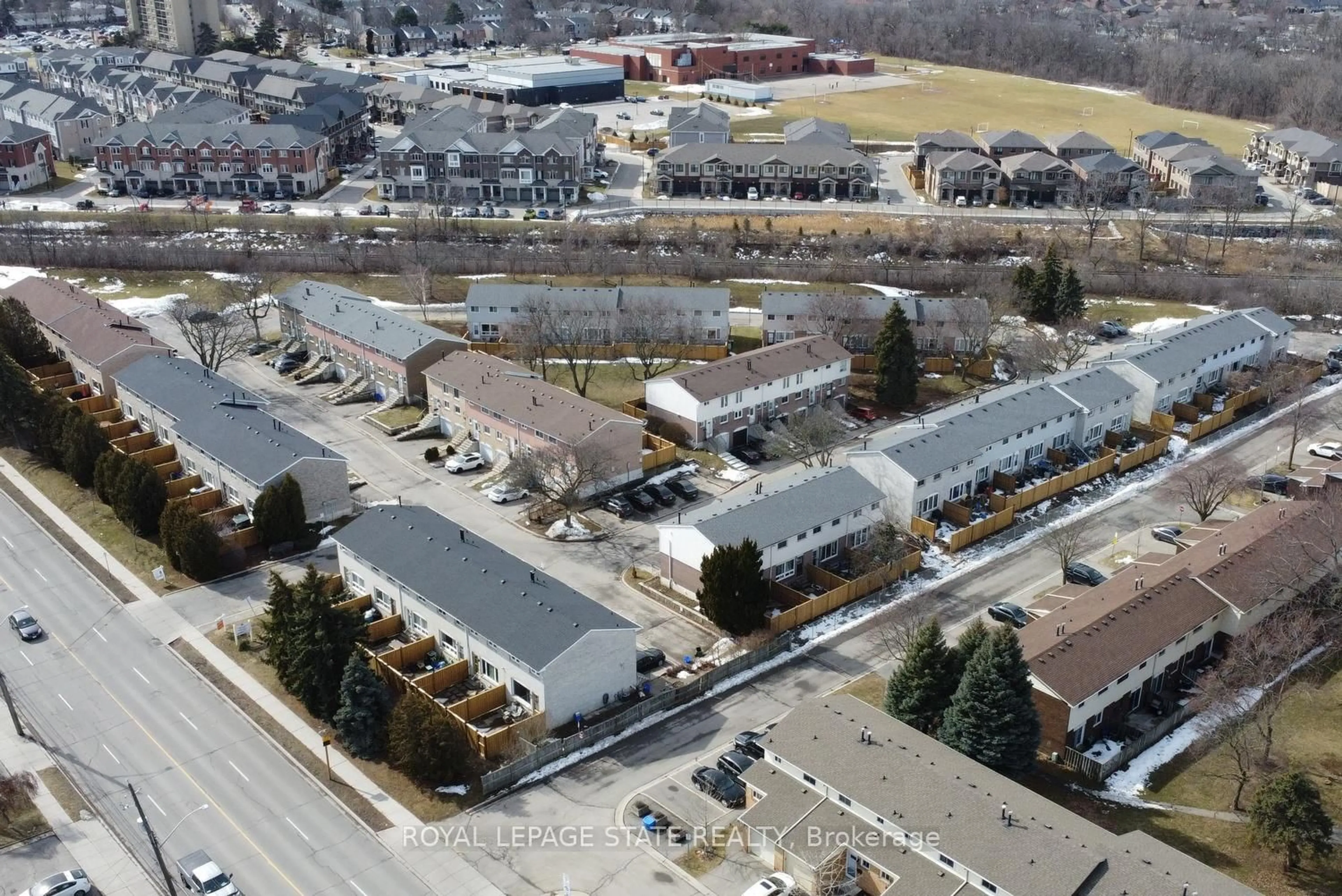 A pic from outside/outdoor area/front of a property/back of a property/a pic from drone, street for 120 Quigley Rd #72, Hamilton Ontario L8K 6L4