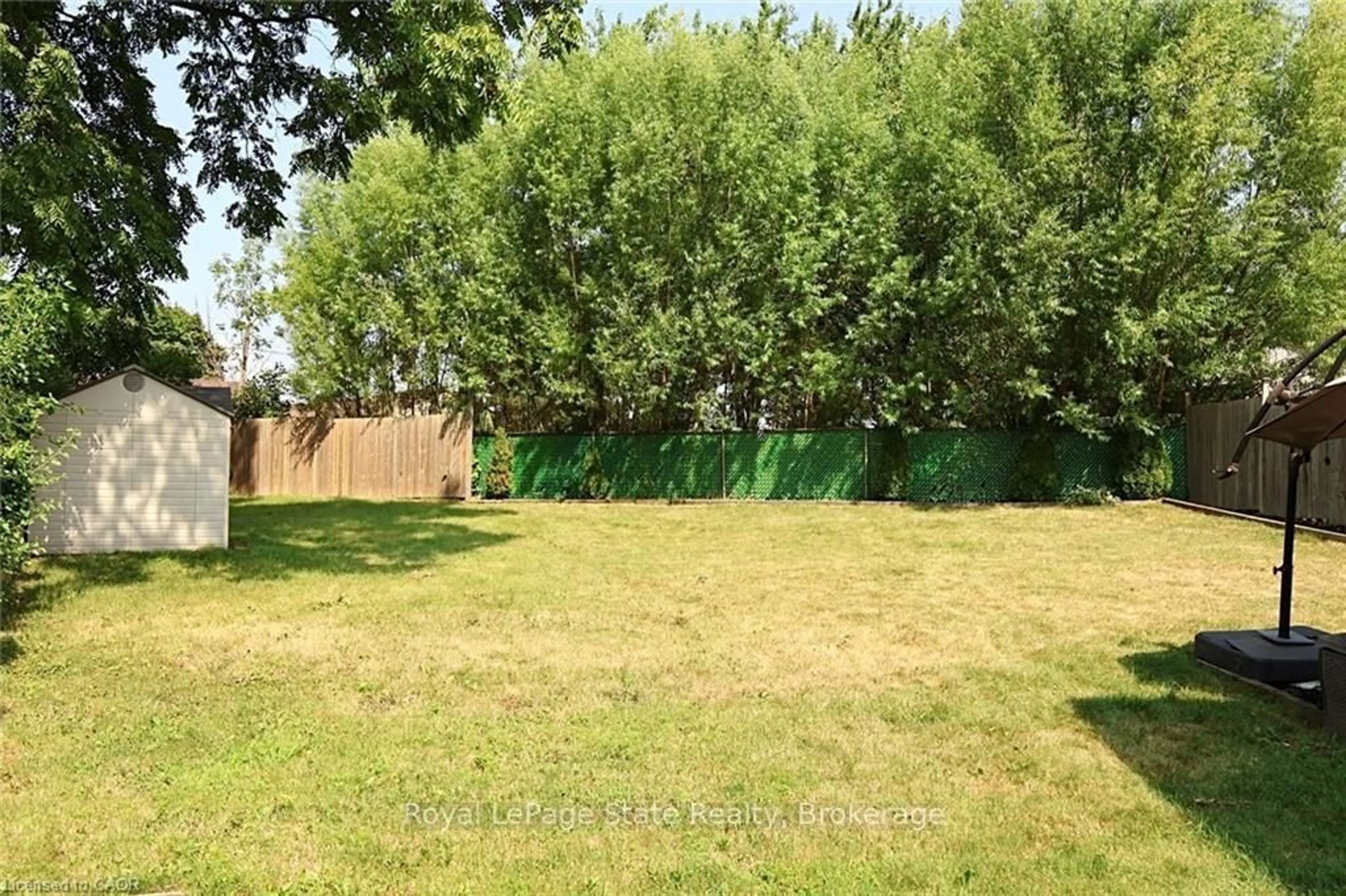 A pic from outside/outdoor area/front of a property/back of a property/a pic from drone, forest/trees view for 9 Duncairn Crt, Hamilton Ontario L9C 6G2