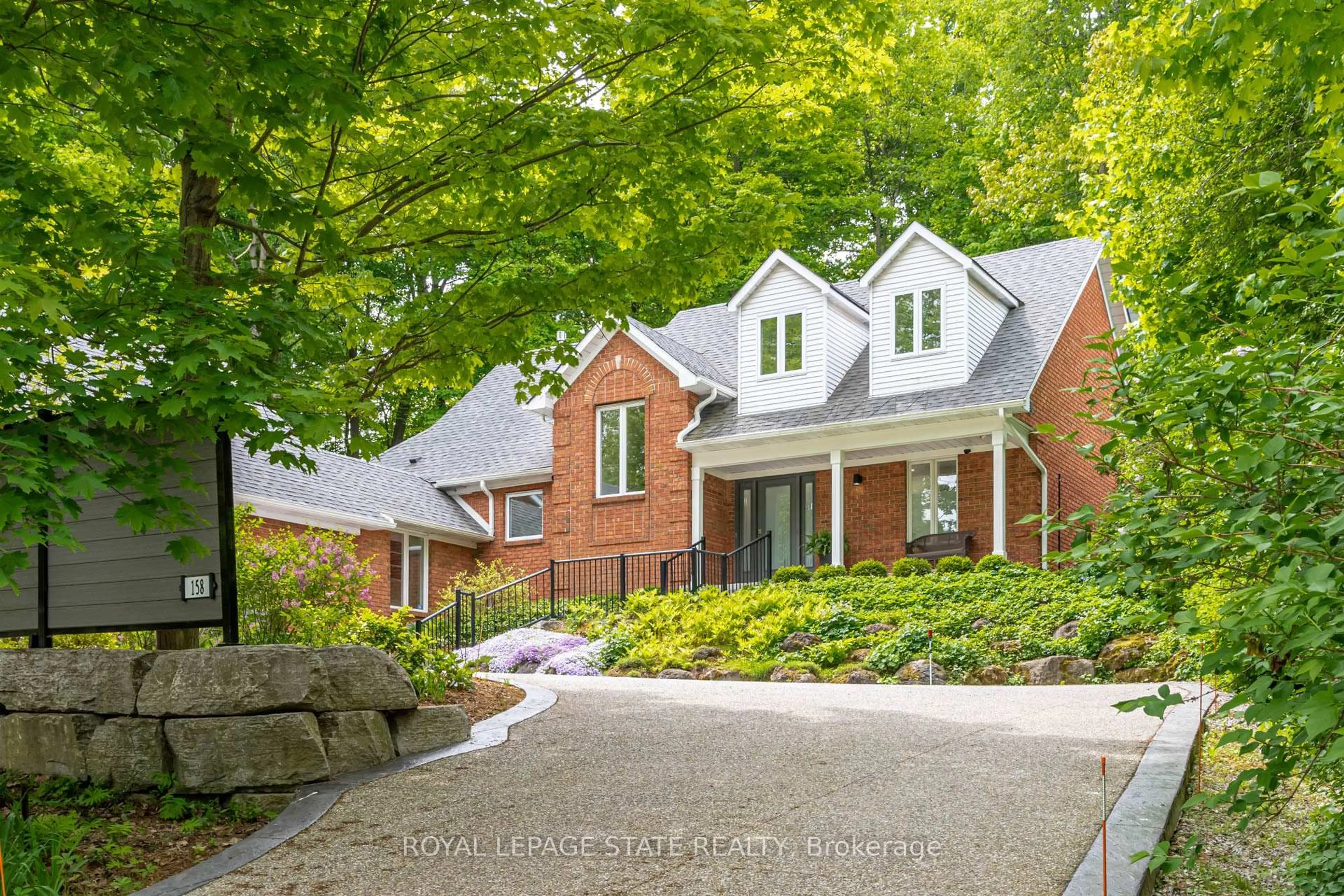 Home with brick exterior material, street for 158 Sulphur Springs Rd, Hamilton Ontario L9G 4Y7