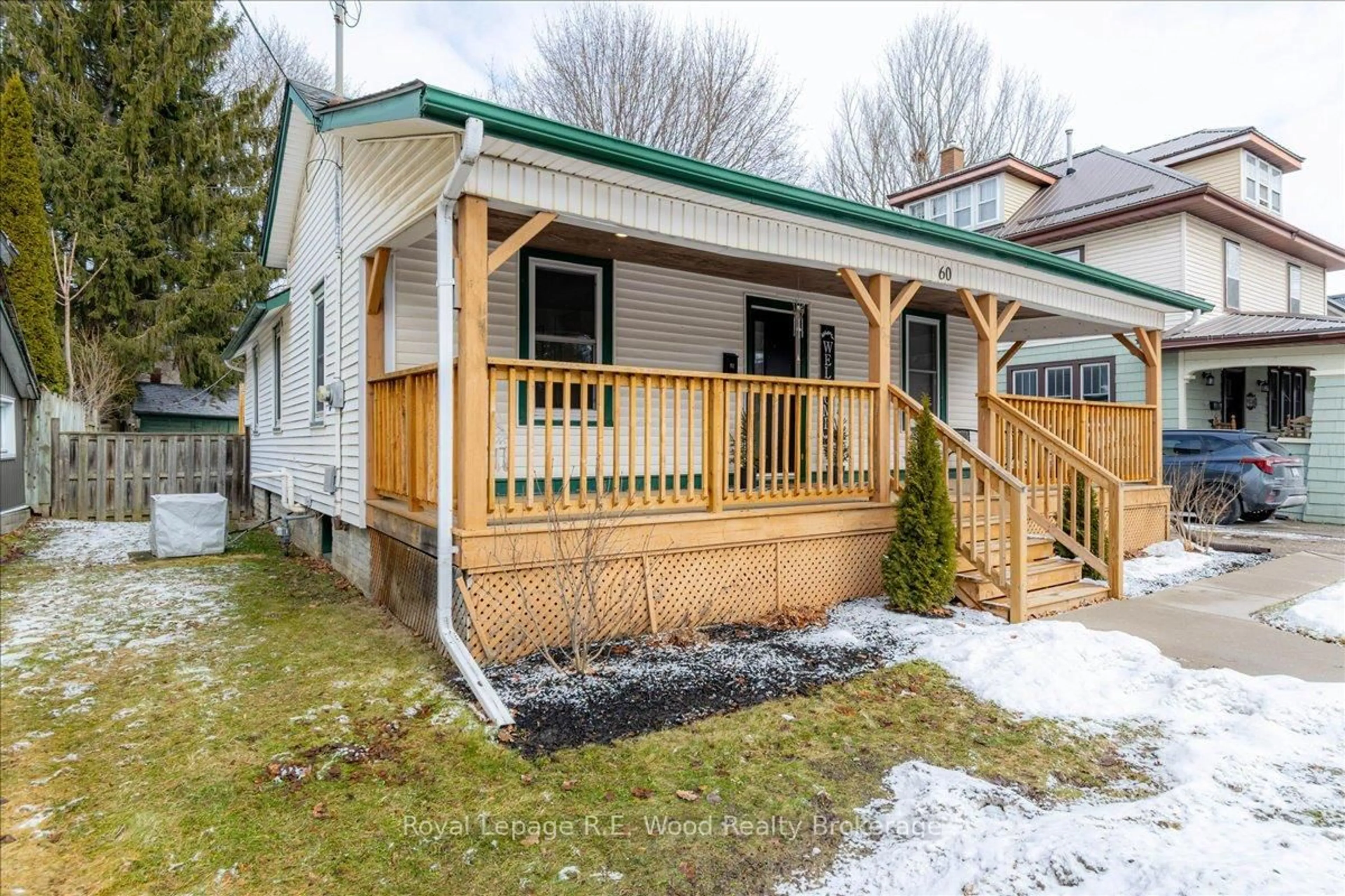 Home with vinyl exterior material, street for 60 Concession St, Tillsonburg Ontario N4G 1P5