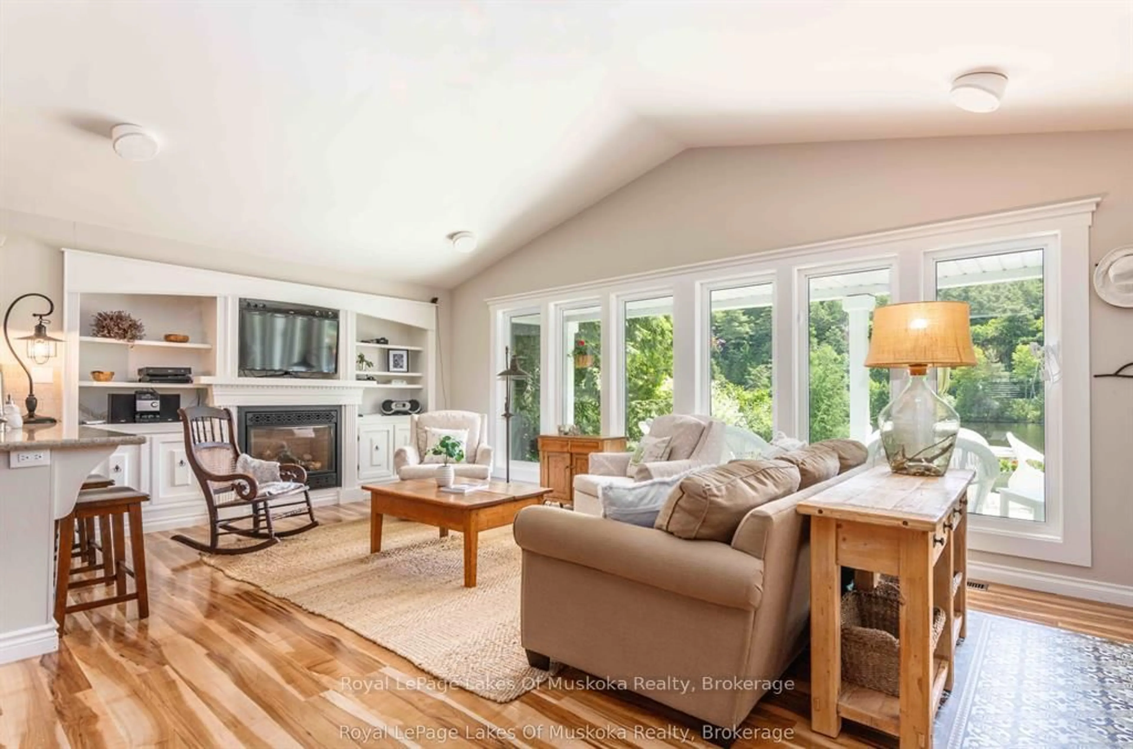 Living room with furniture, wood/laminate floor for 9 Mountview Ave, Huntsville Ontario P1H 1G8