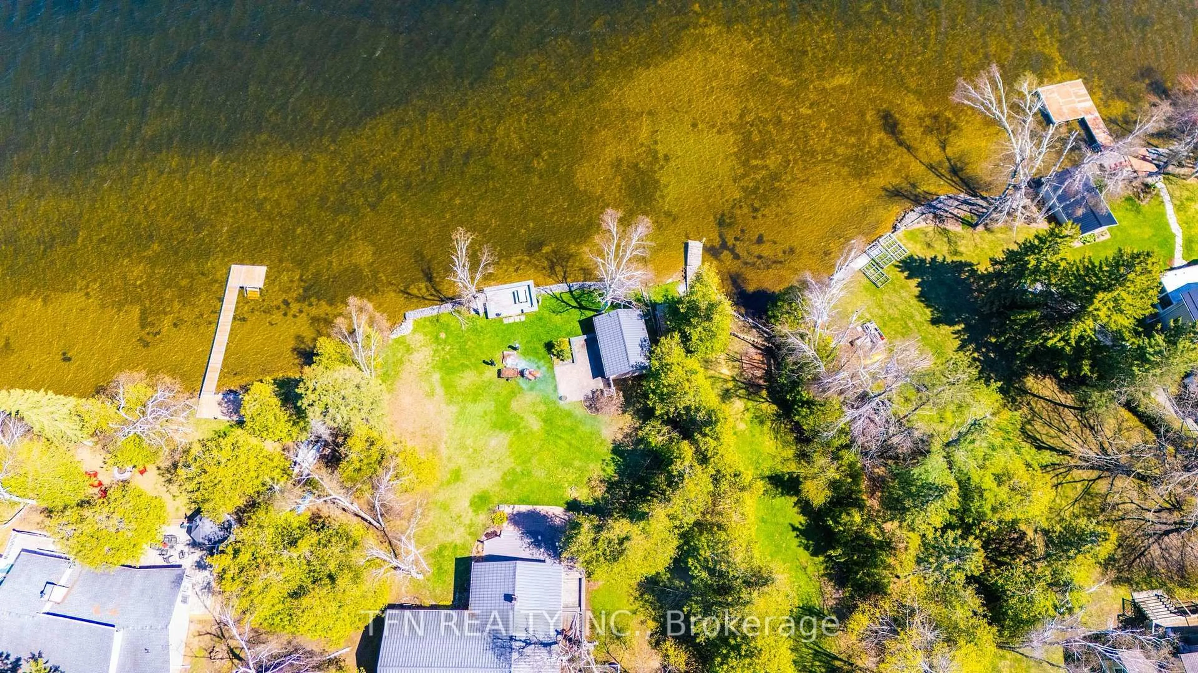 A pic from outside/outdoor area/front of a property/back of a property/a pic from drone, water/lake/river/ocean view for 4 Pinewood Blvd, Kawartha Lakes Ontario K0M 2T0