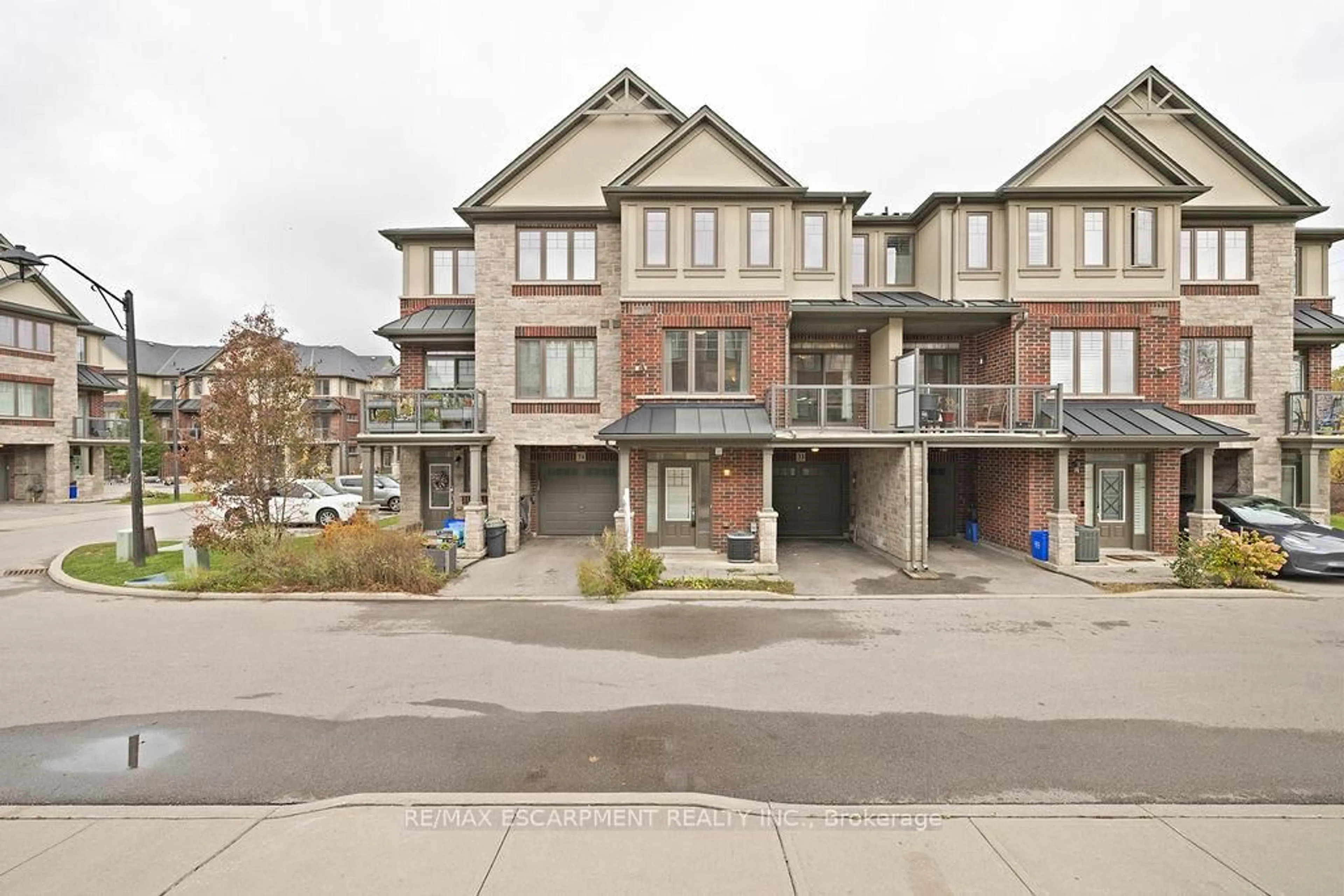 A pic from outside/outdoor area/front of a property/back of a property/a pic from drone, street for 1169 Garner Rd #33, Hamilton Ontario L9G 0G8